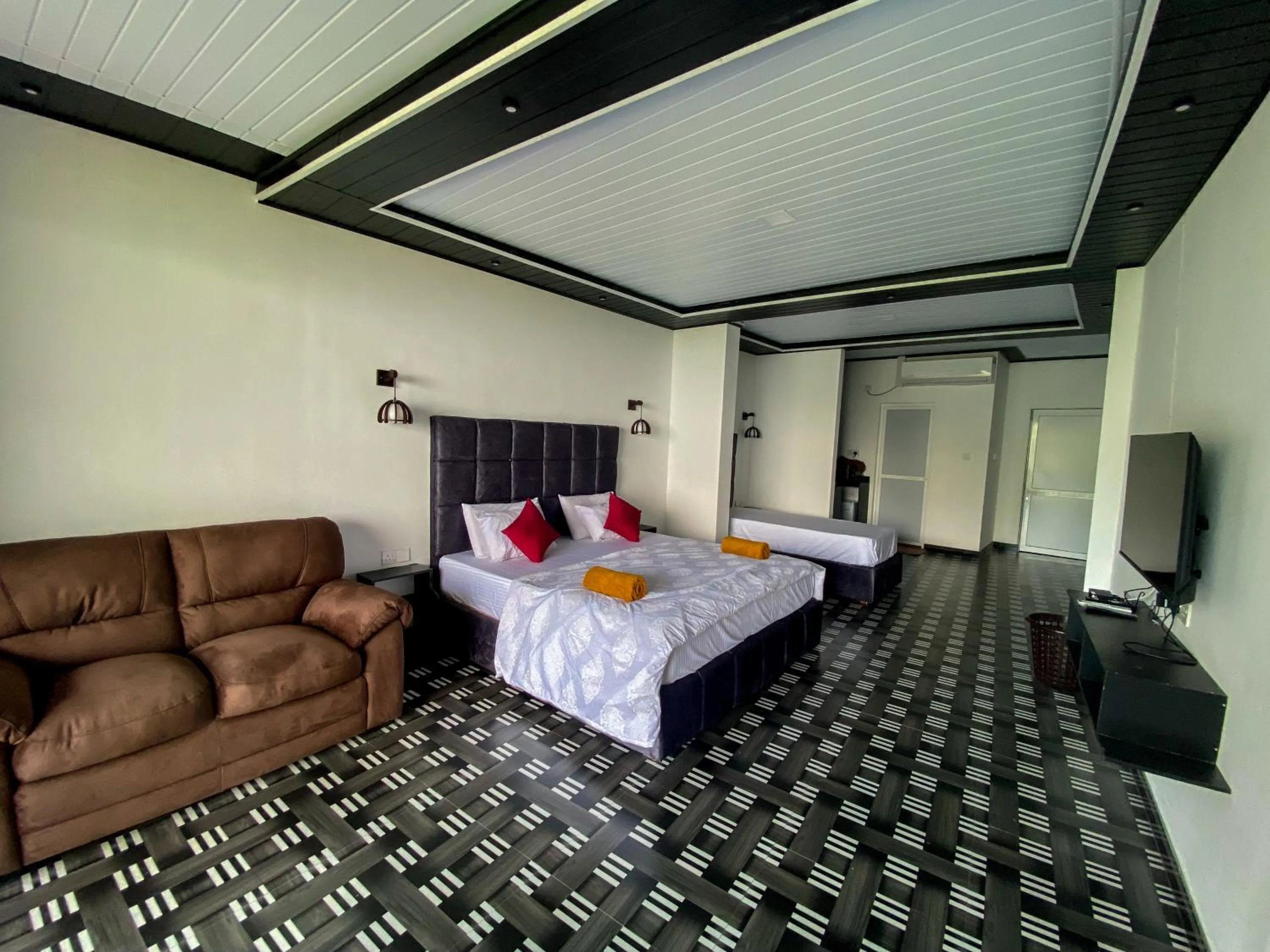 Bed in Paraiso Guest House