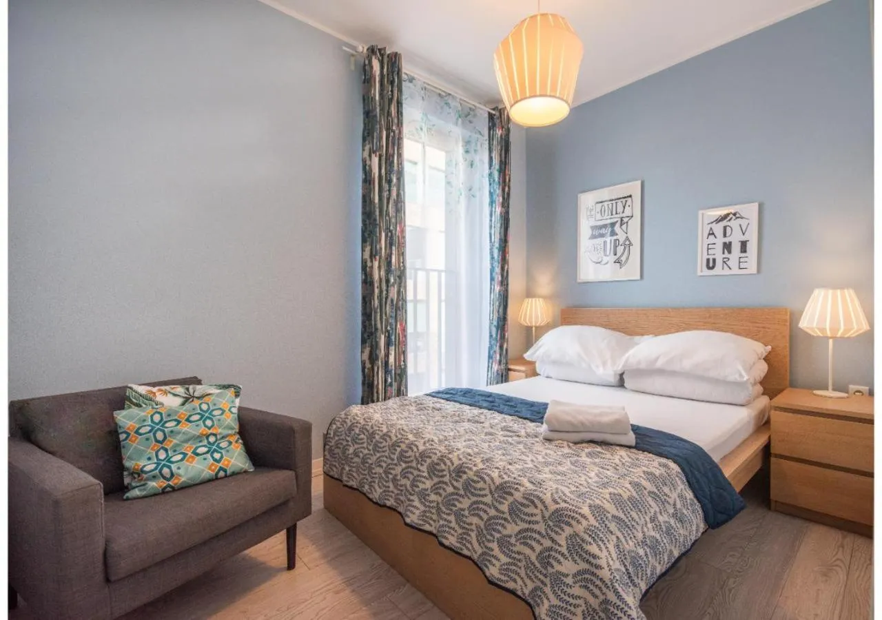 Seating area, Bed in City Lights Apartments