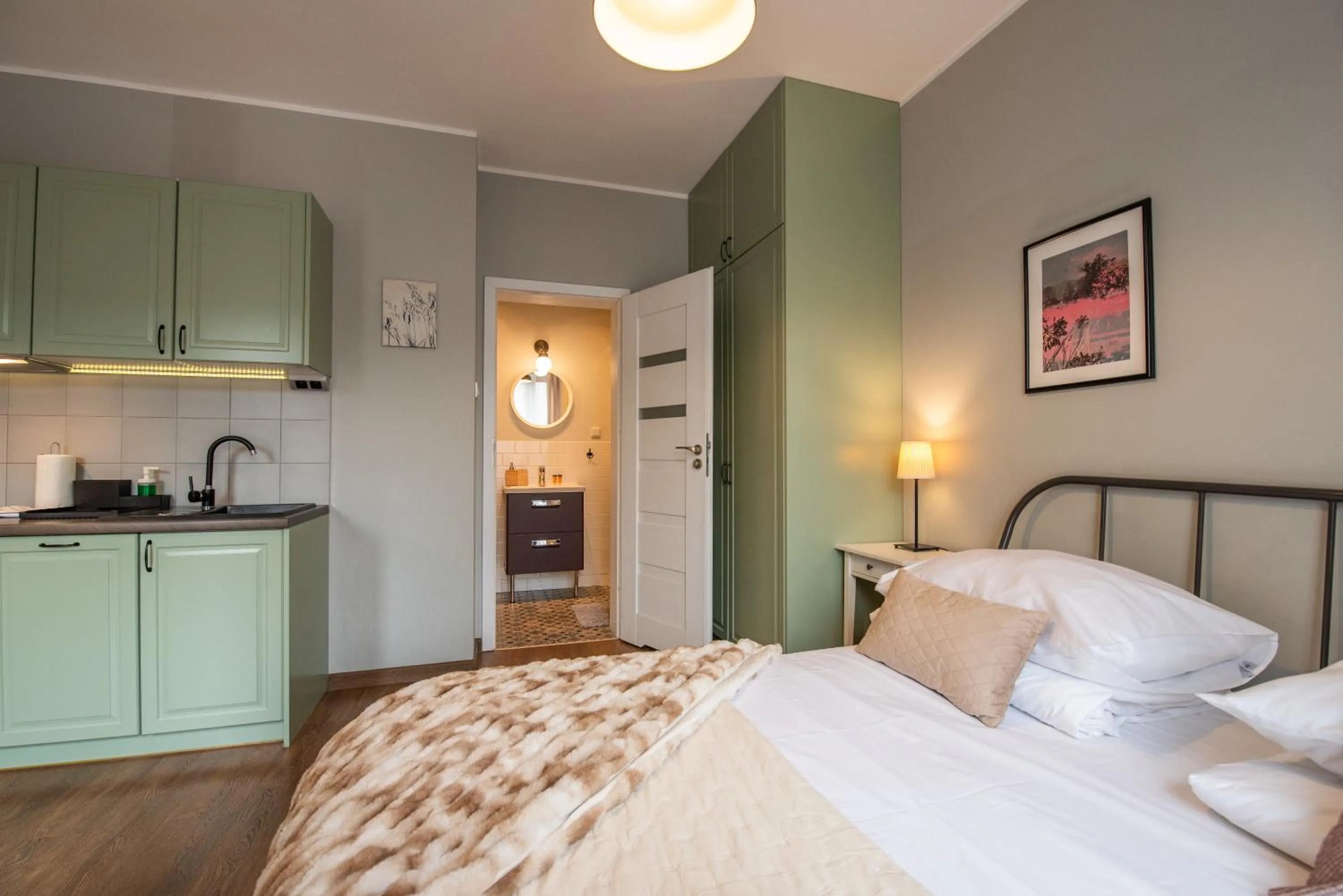 Bed in City Lights Apartments