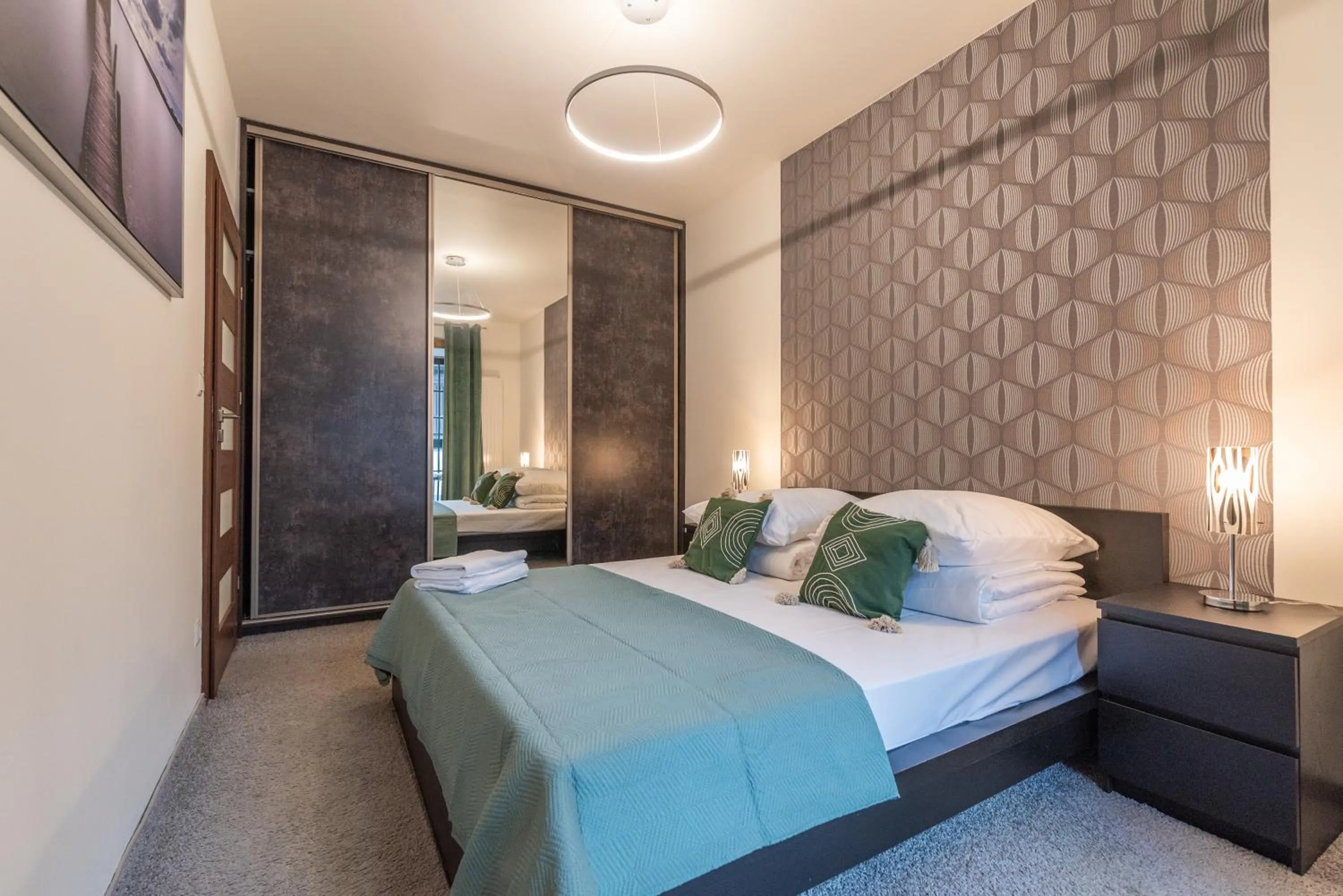 Bed in City Lights Apartments