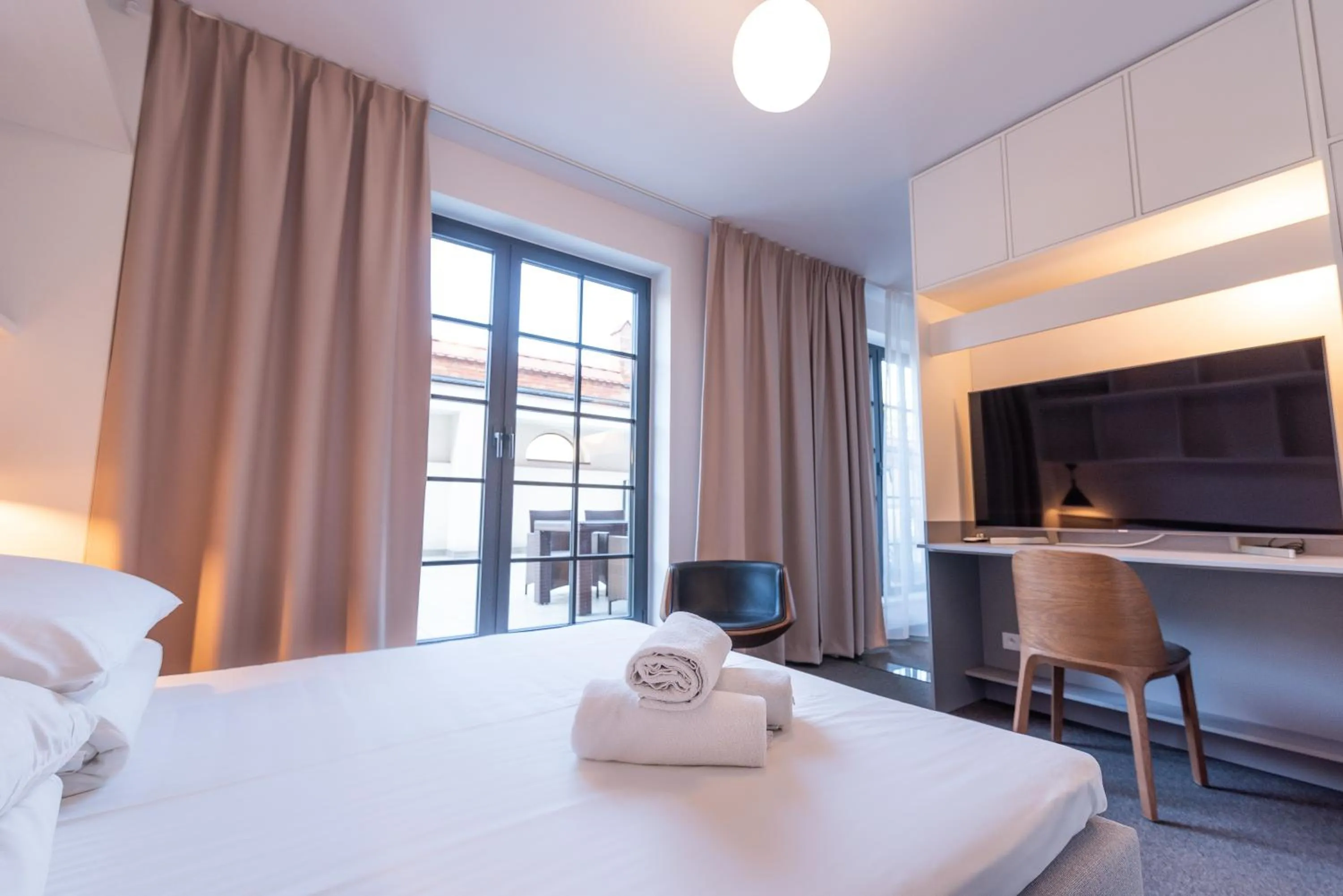 TV and multimedia, Bed in City Lights Apartments