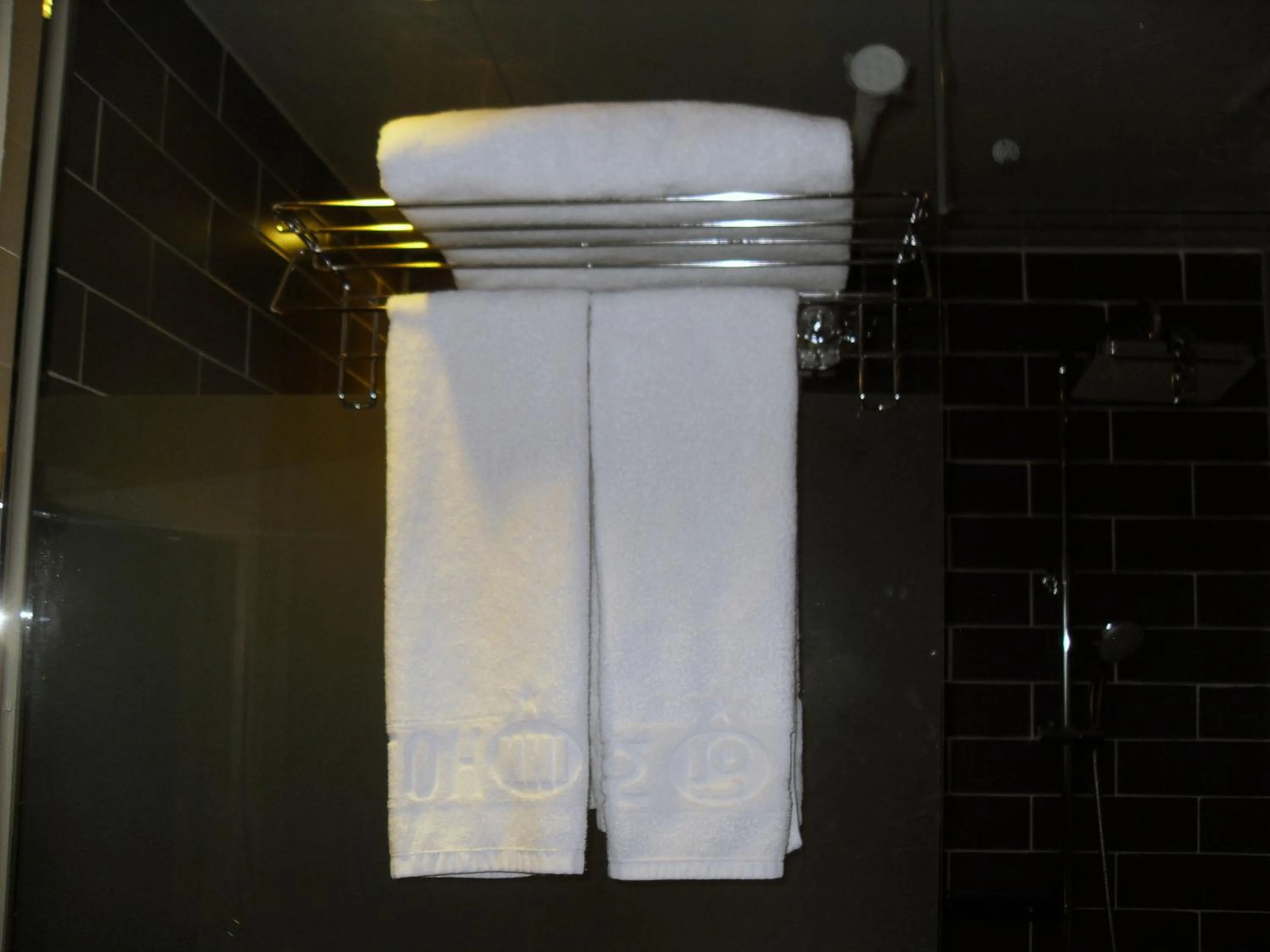 Bathroom in 64 INN Hotel