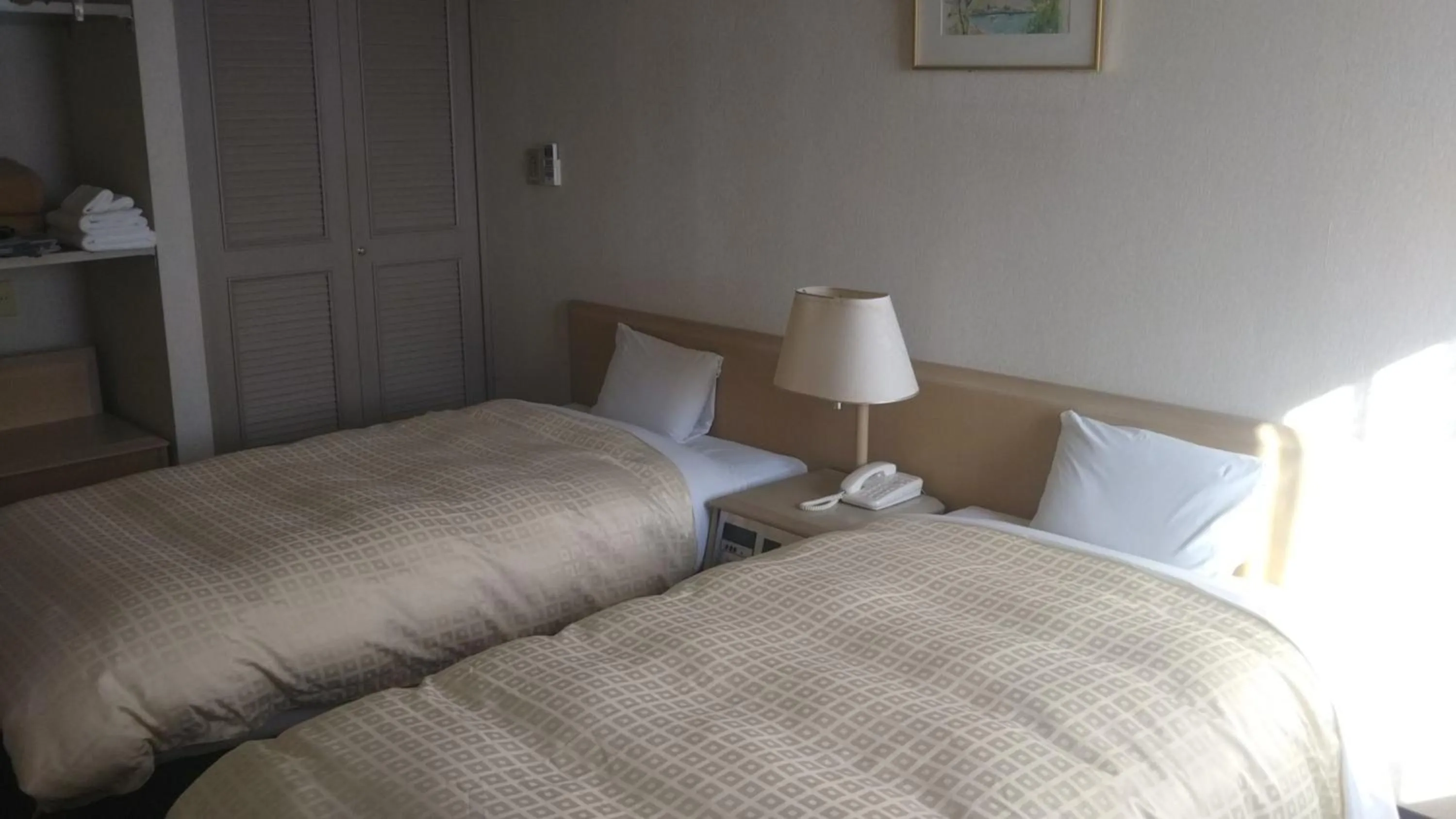 Bed in Hotel Hitachi Hills