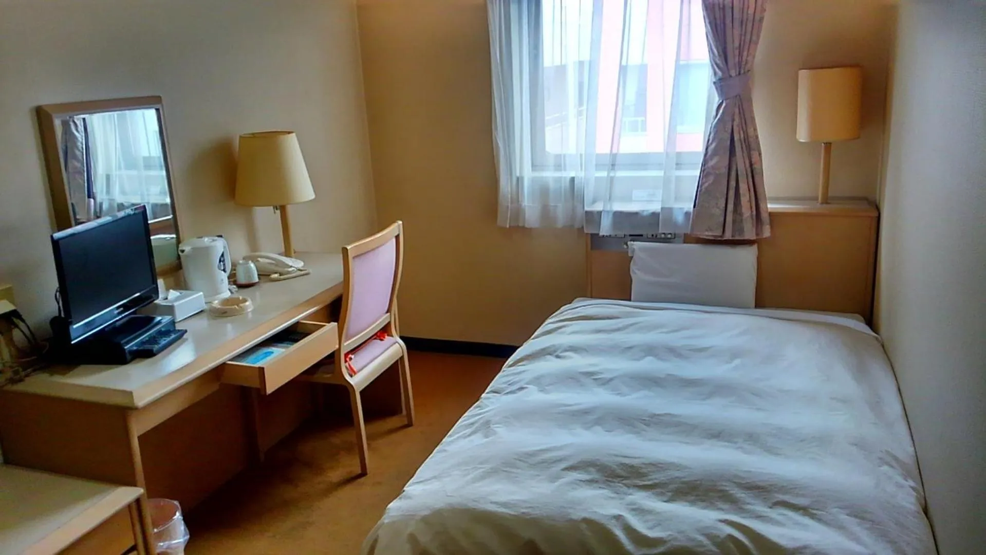 Photo of the whole room, Bed in Hotel Hitachi Hills