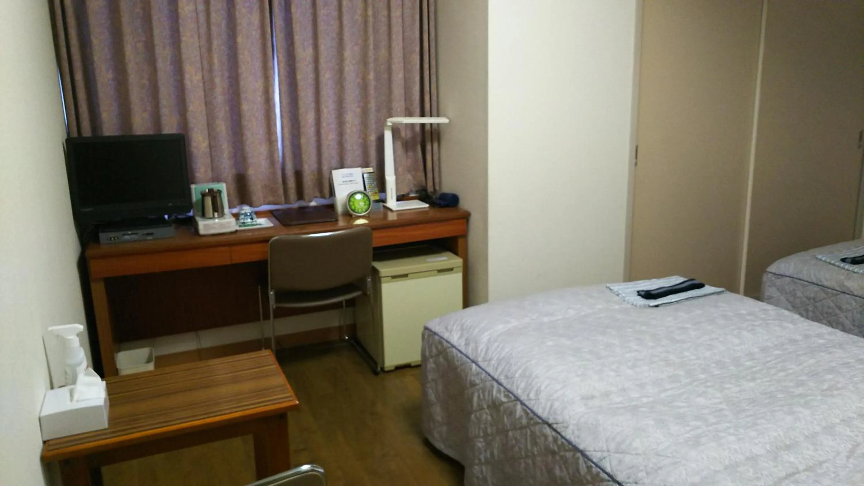 Photo of the whole room, Bed in New Central Hotel Katsuta
