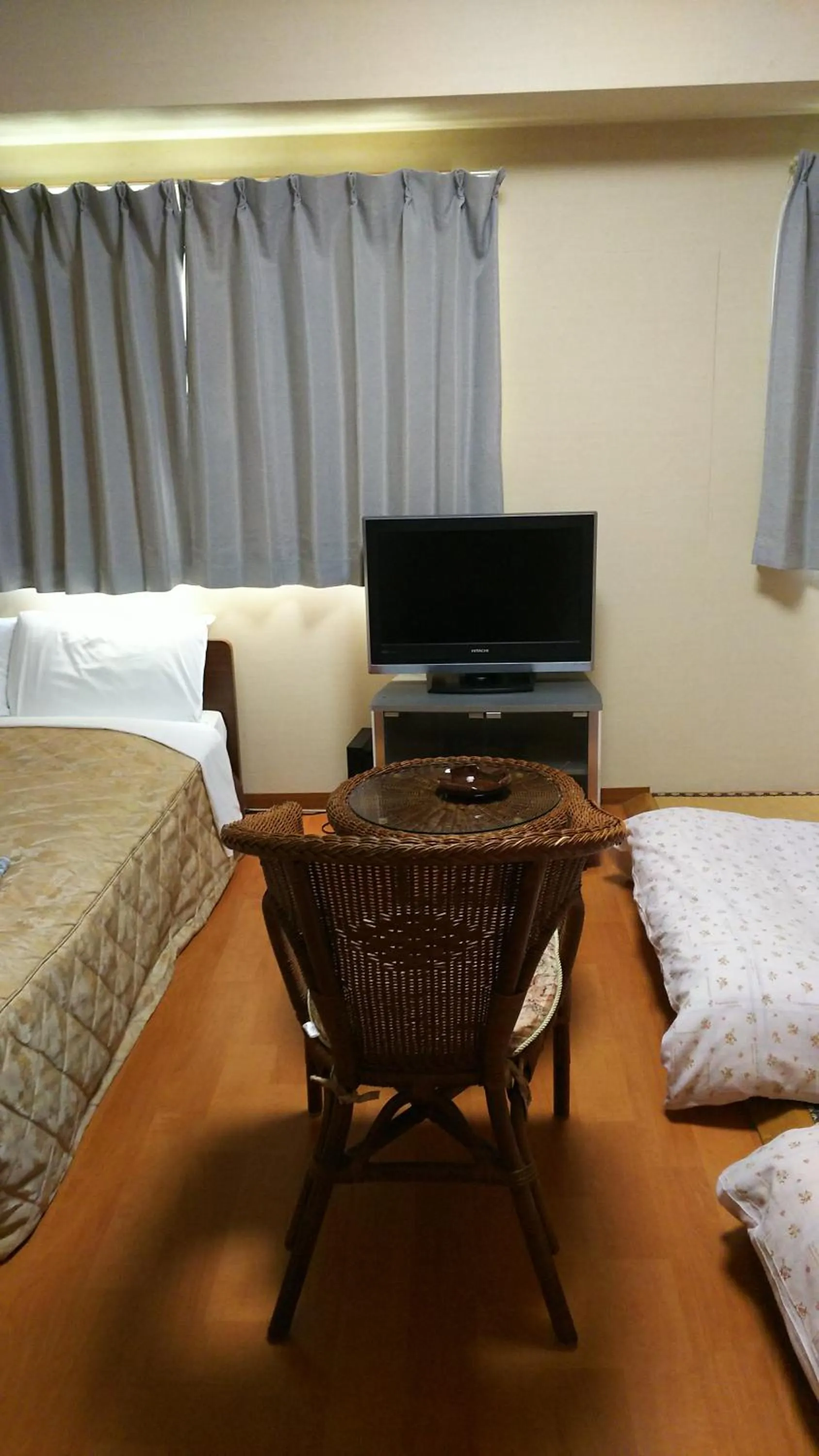 Photo of the whole room, Bed in New Central Hotel Katsuta