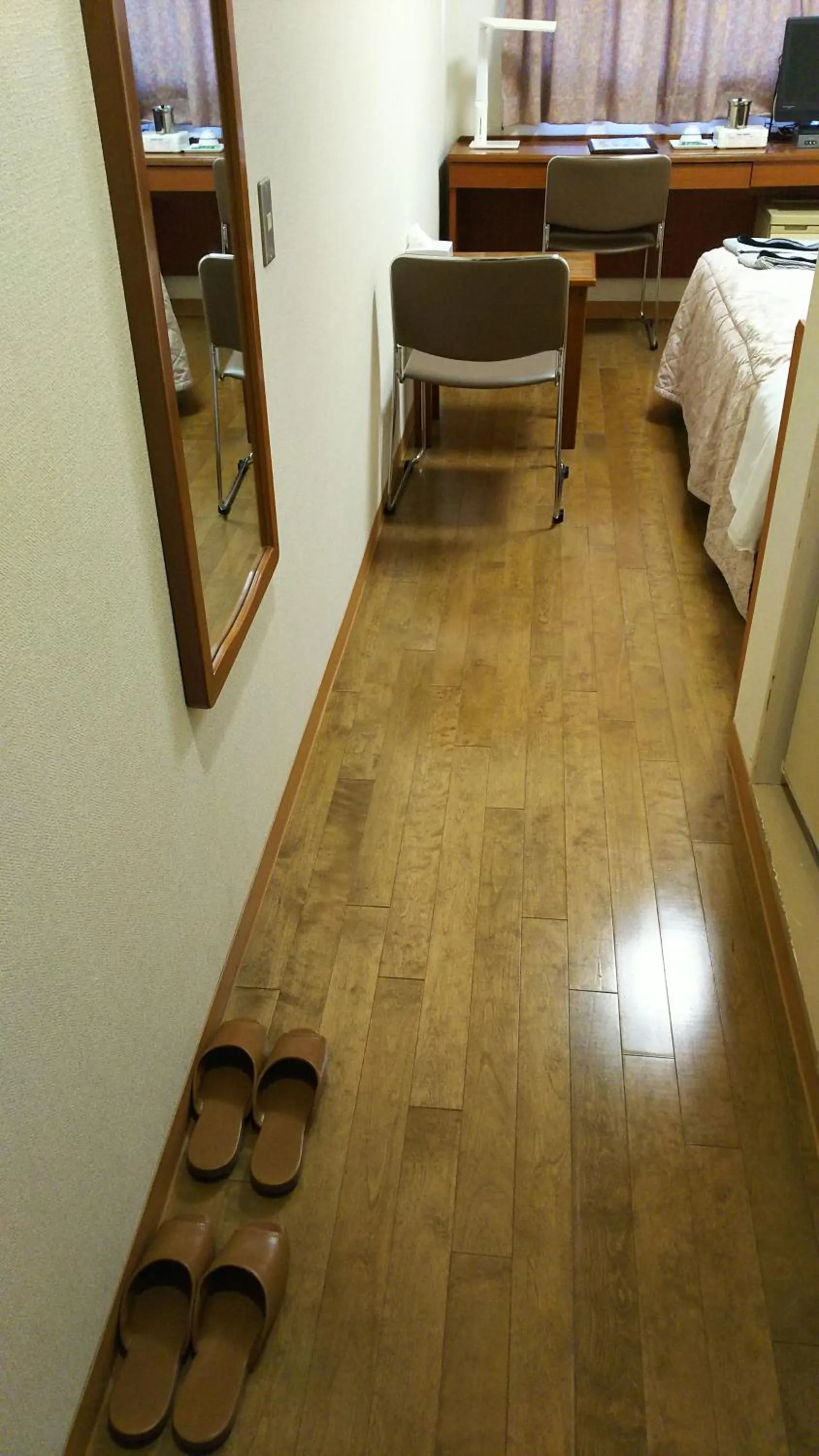 Photo of the whole room, Bed in New Central Hotel Katsuta