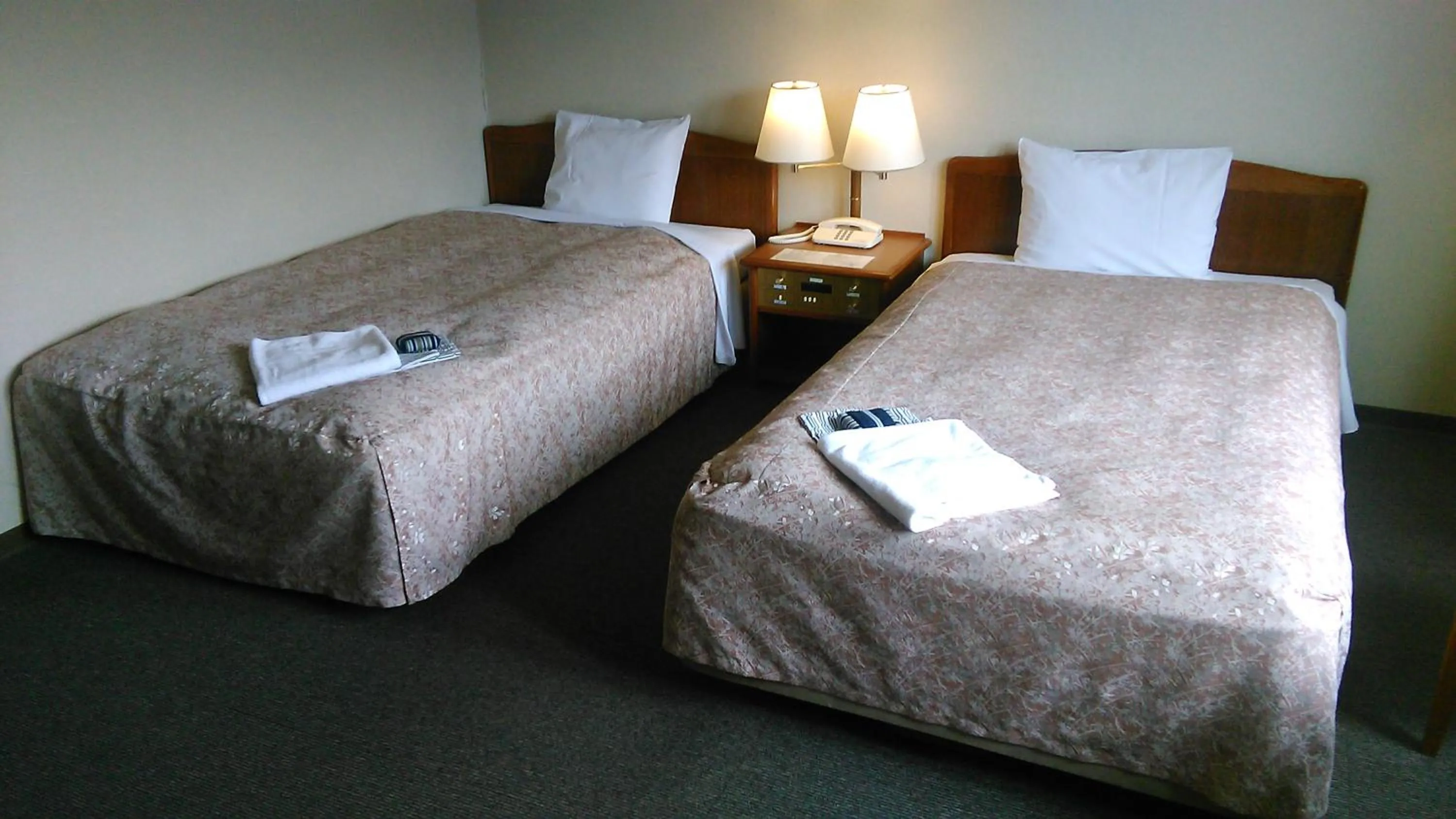 Photo of the whole room, Bed in Hotel Crown Hills Takefu