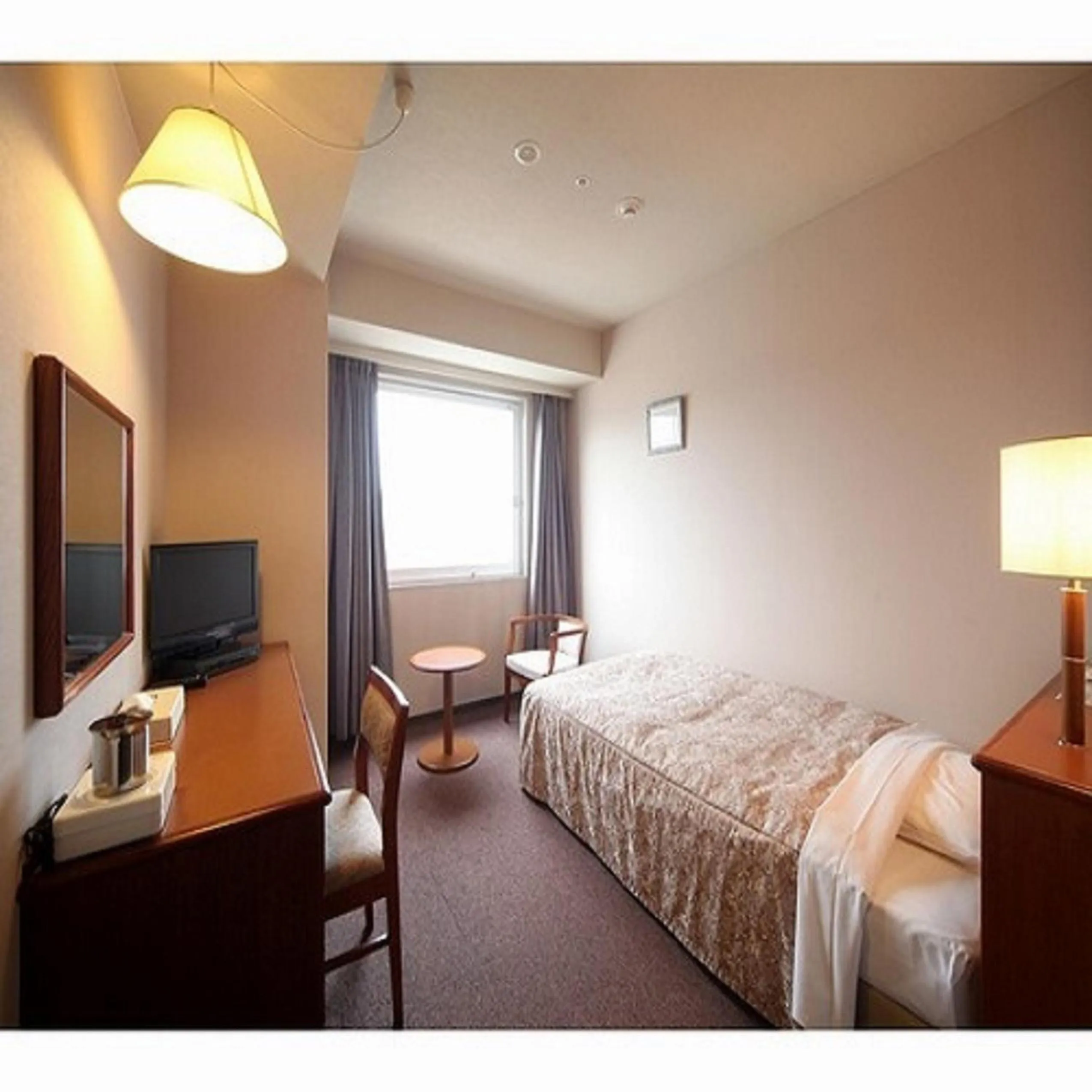 Bed in Hotel Crown Hills Takefu