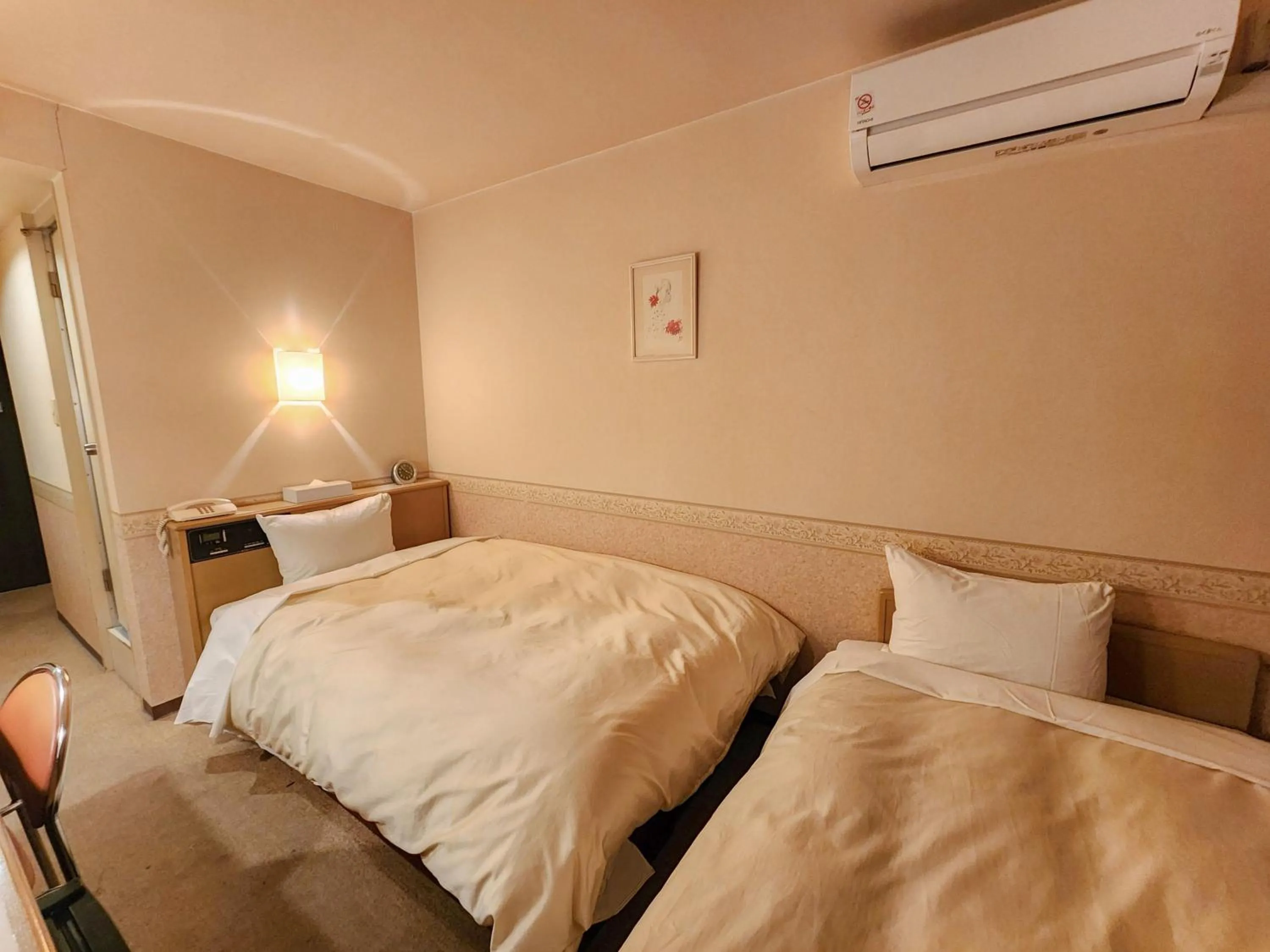 Photo of the whole room, Bed in Hotel Crown Hills Kanazawa