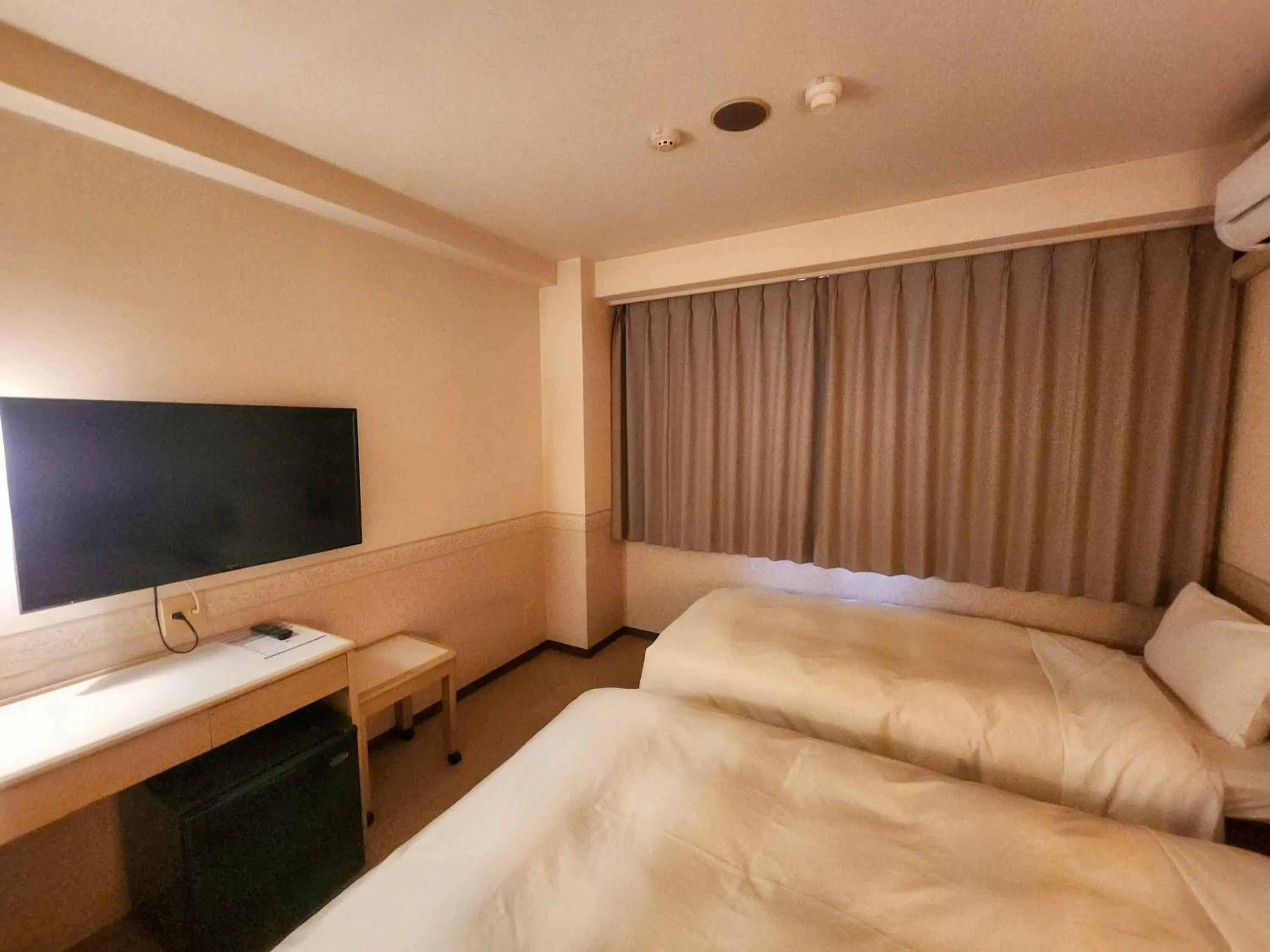 Photo of the whole room, Bed in Hotel Crown Hills Kanazawa