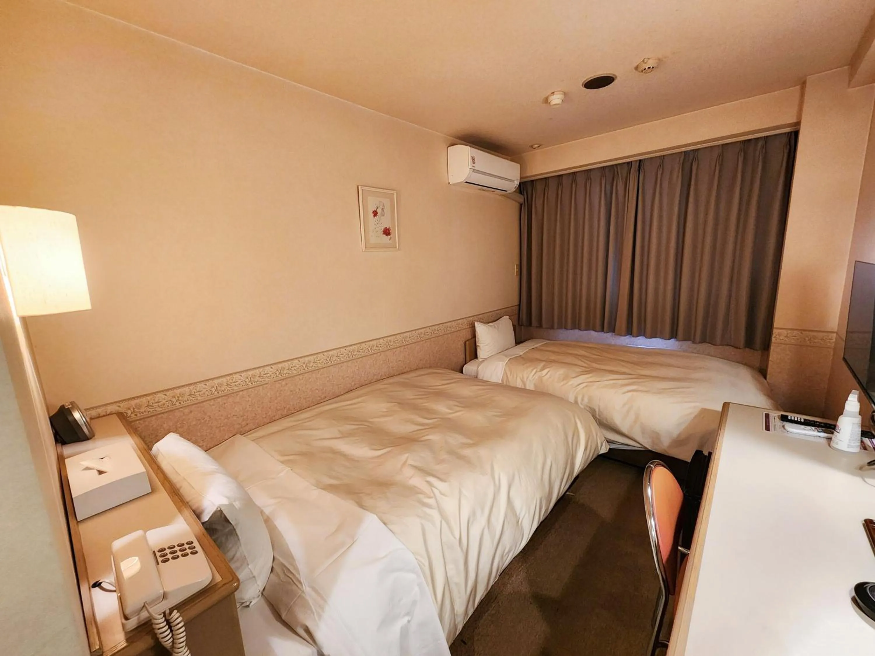 Photo of the whole room, Bed in Hotel Crown Hills Kanazawa