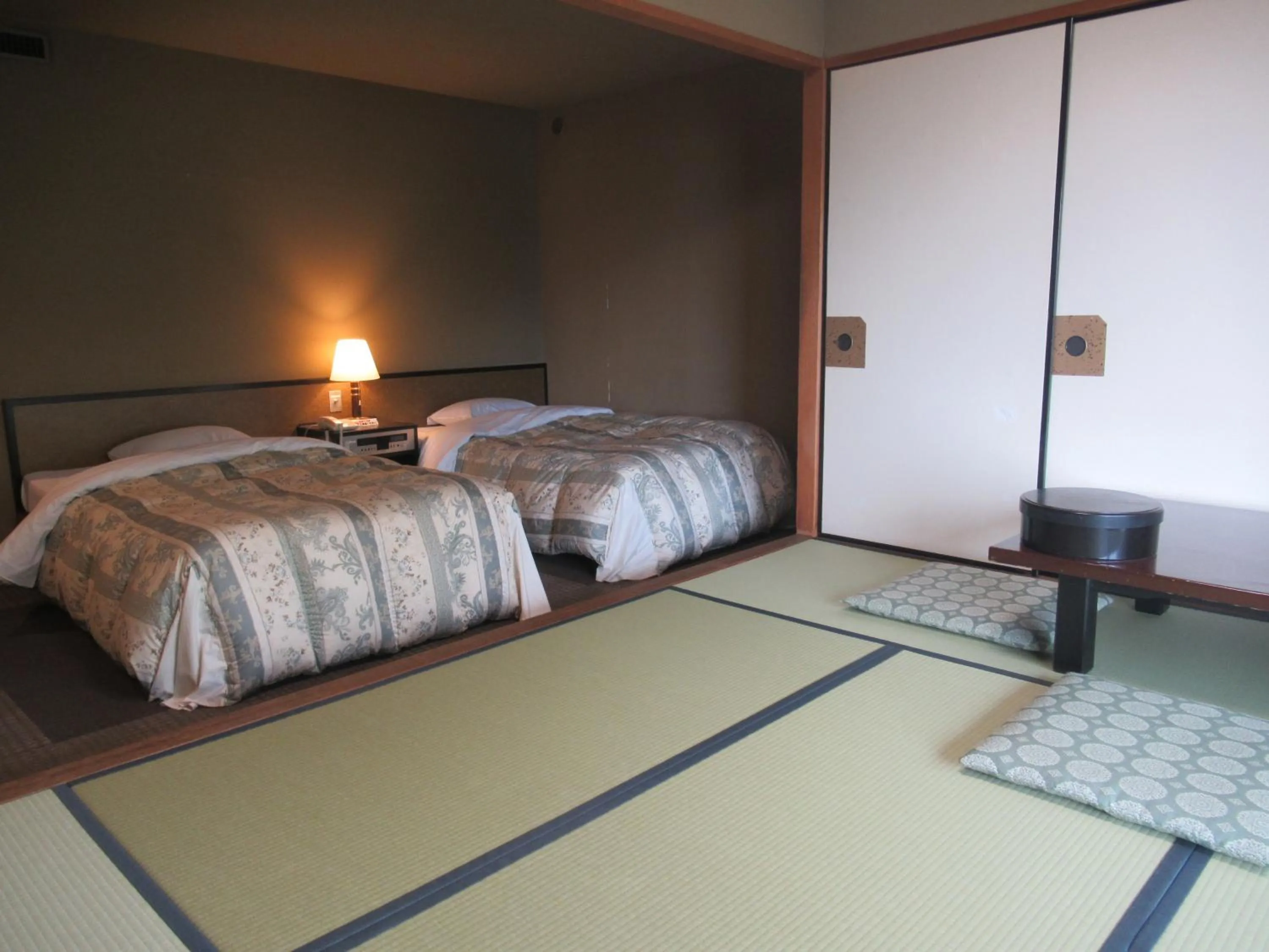 Photo of the whole room, Bed in Kikuchi Kanko Hotel