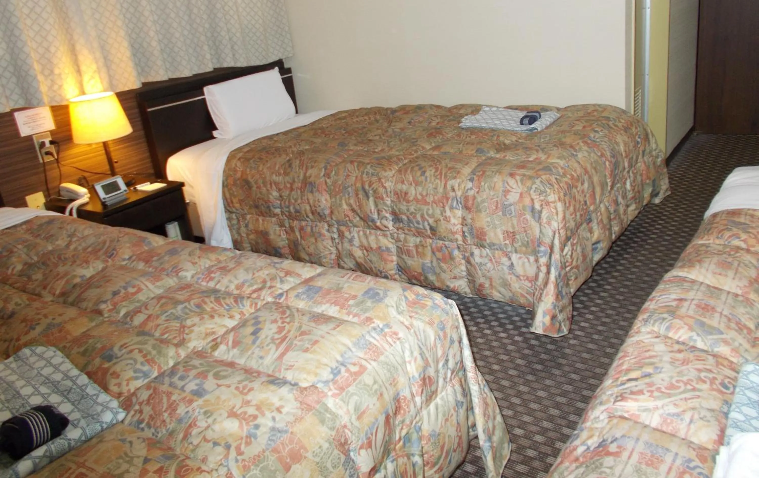 Bed in Hotel Matsuyama Hills