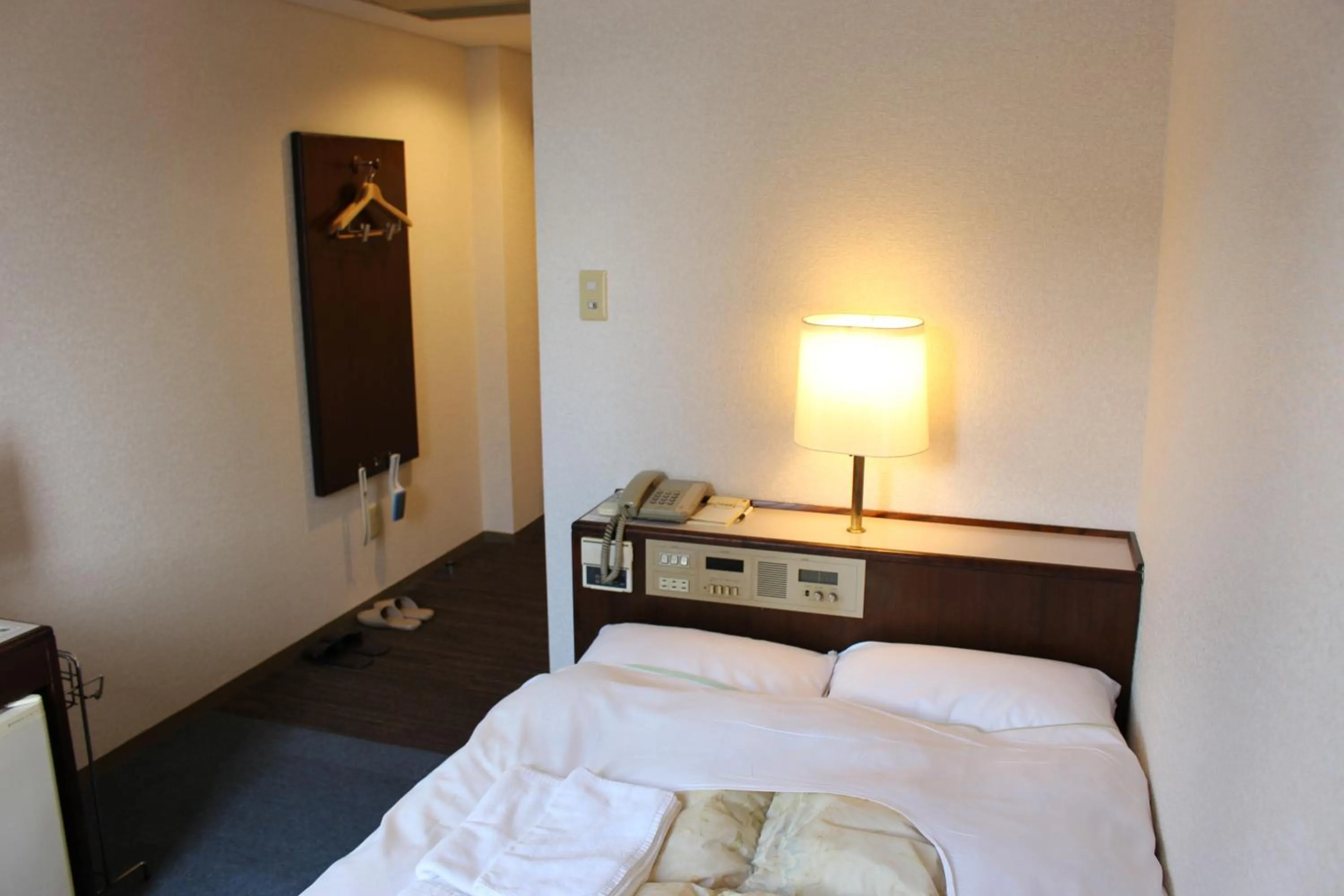 Bed in Hotel Higashihiroshima Hills Saijo