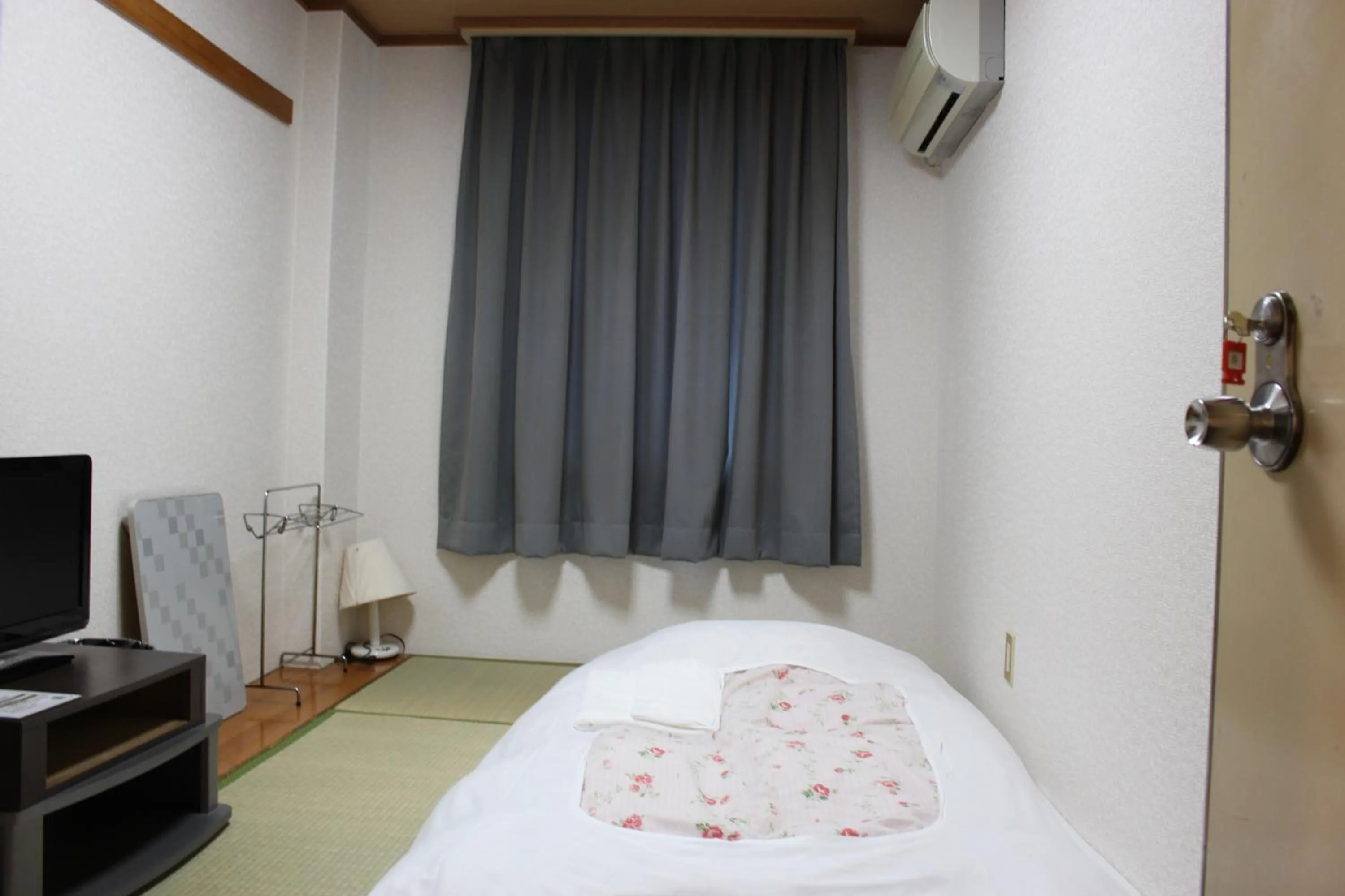 Bed in Hotel Higashihiroshima Hills Saijo
