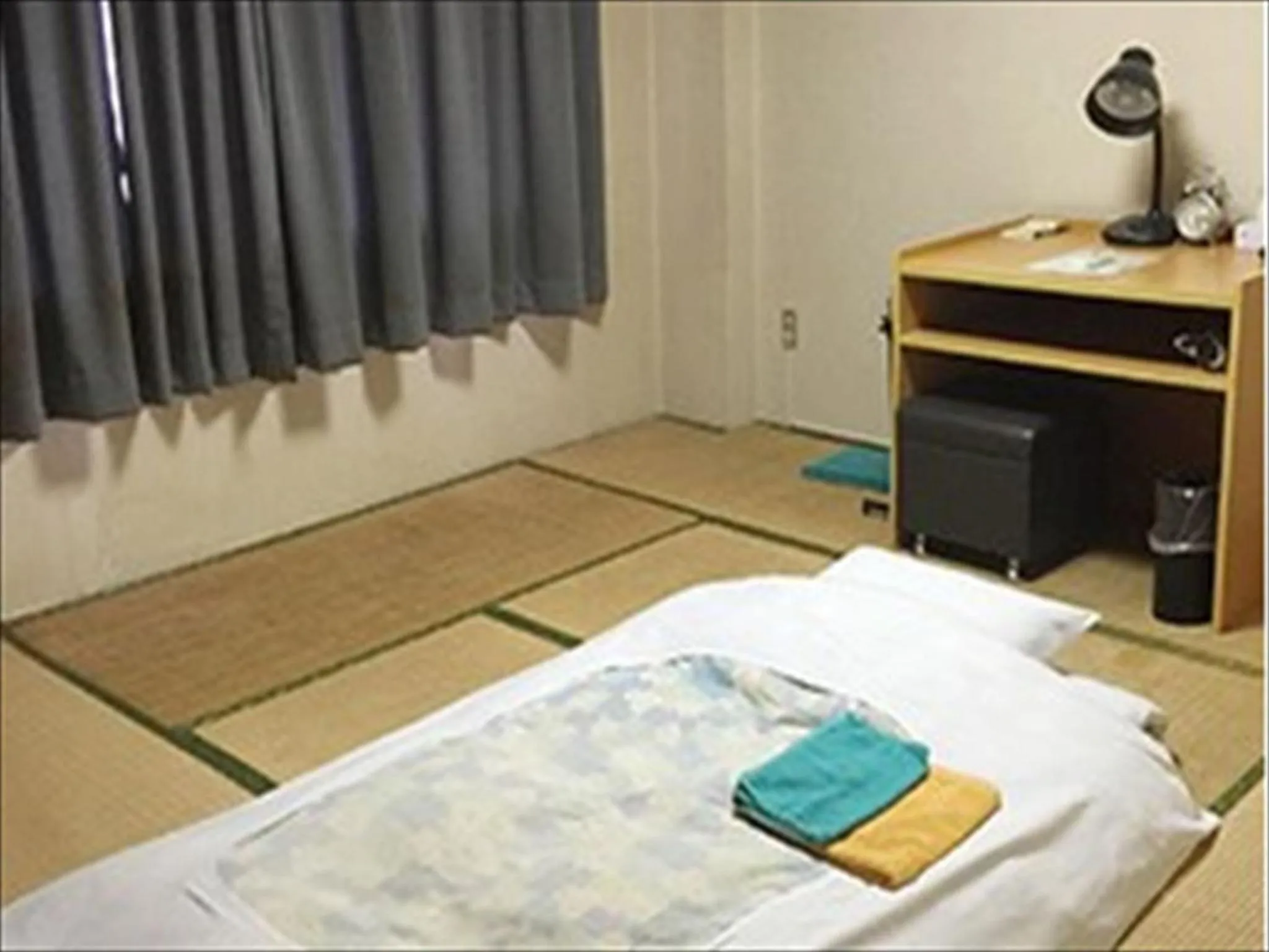 Bed in Hotel Higashihiroshima Hills Saijo
