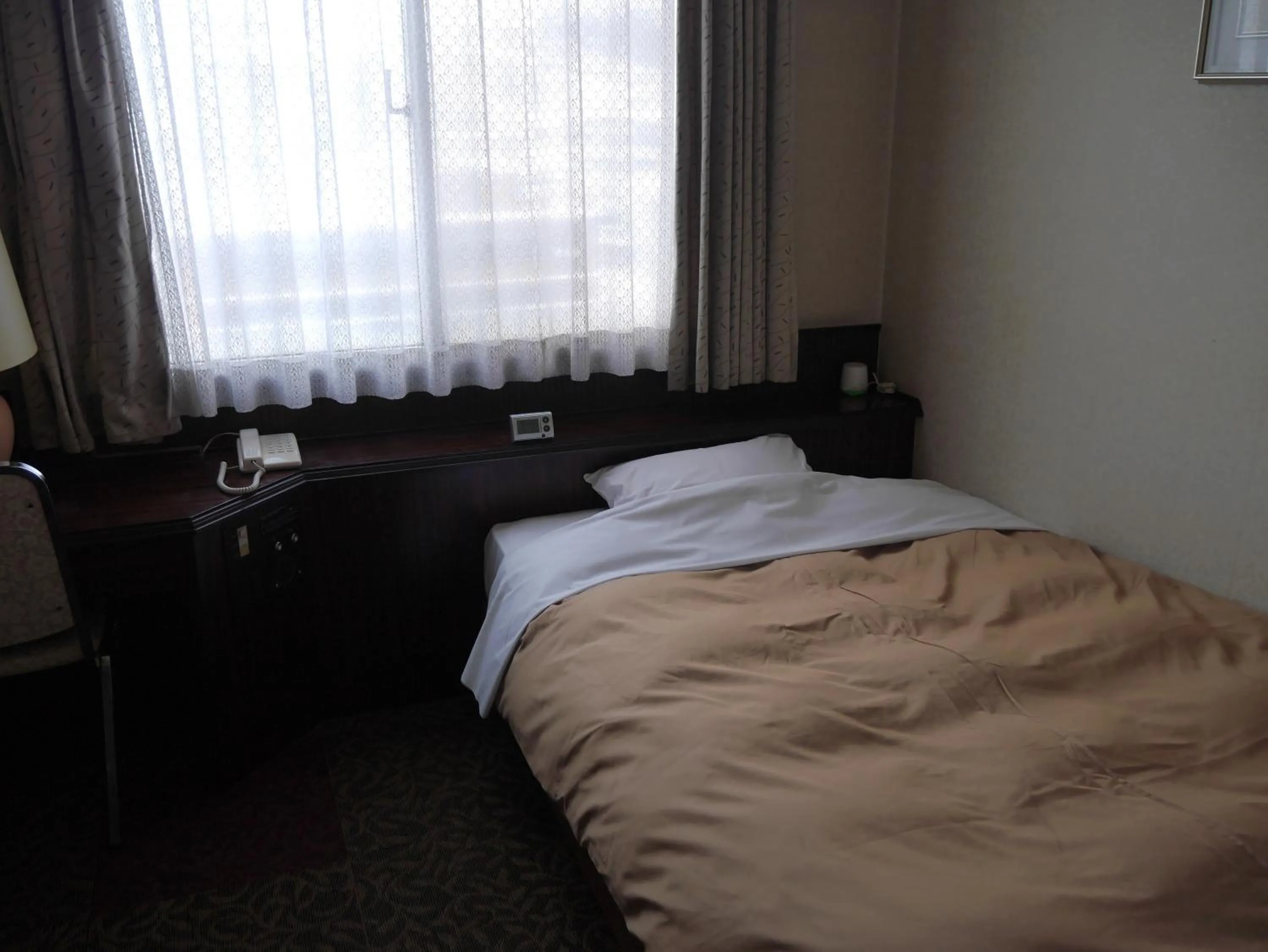 Bed in Hotel CROWN HILLS MIYOSHI