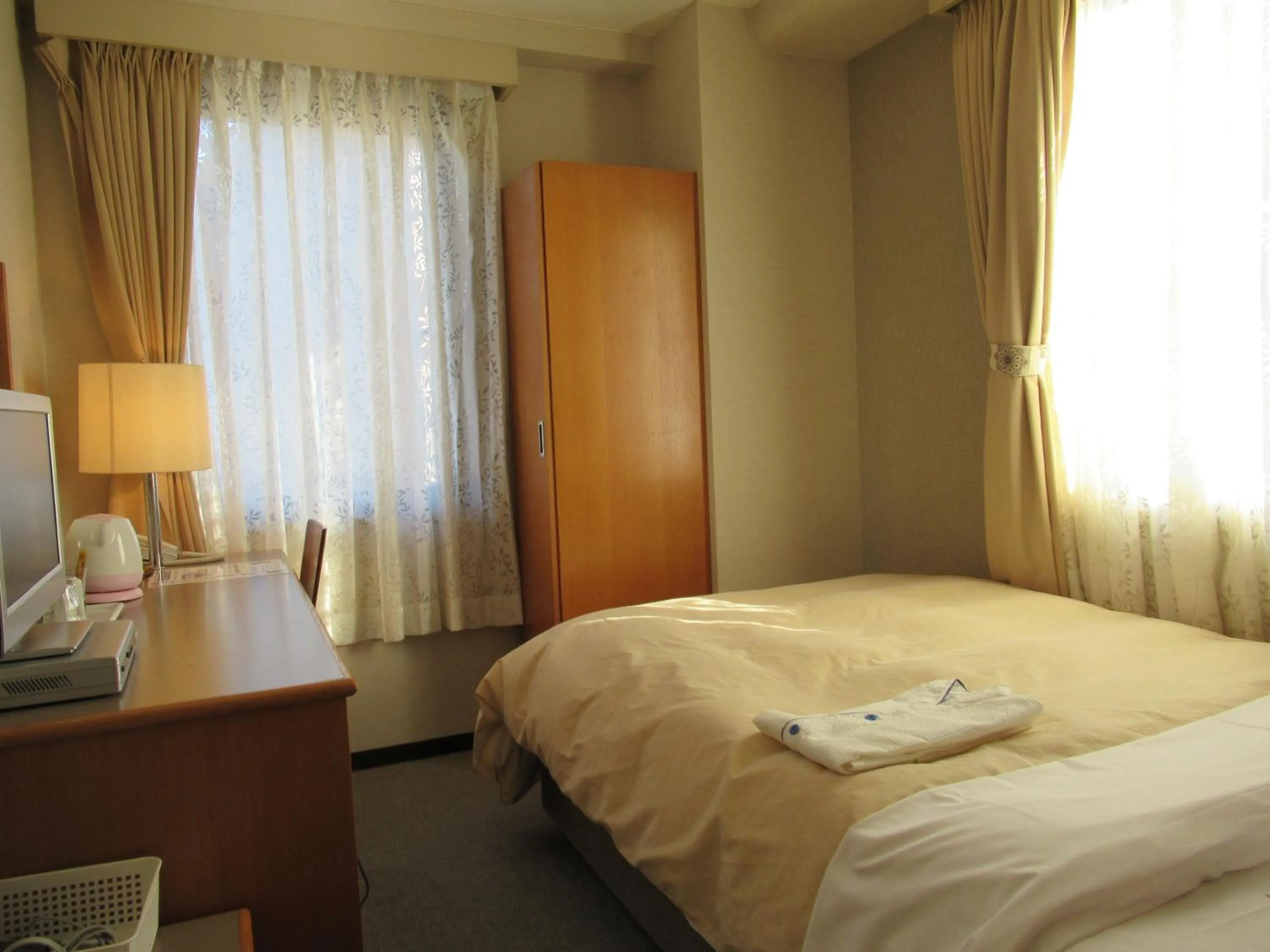 Photo of the whole room, Bed in Center Hotel Mihara