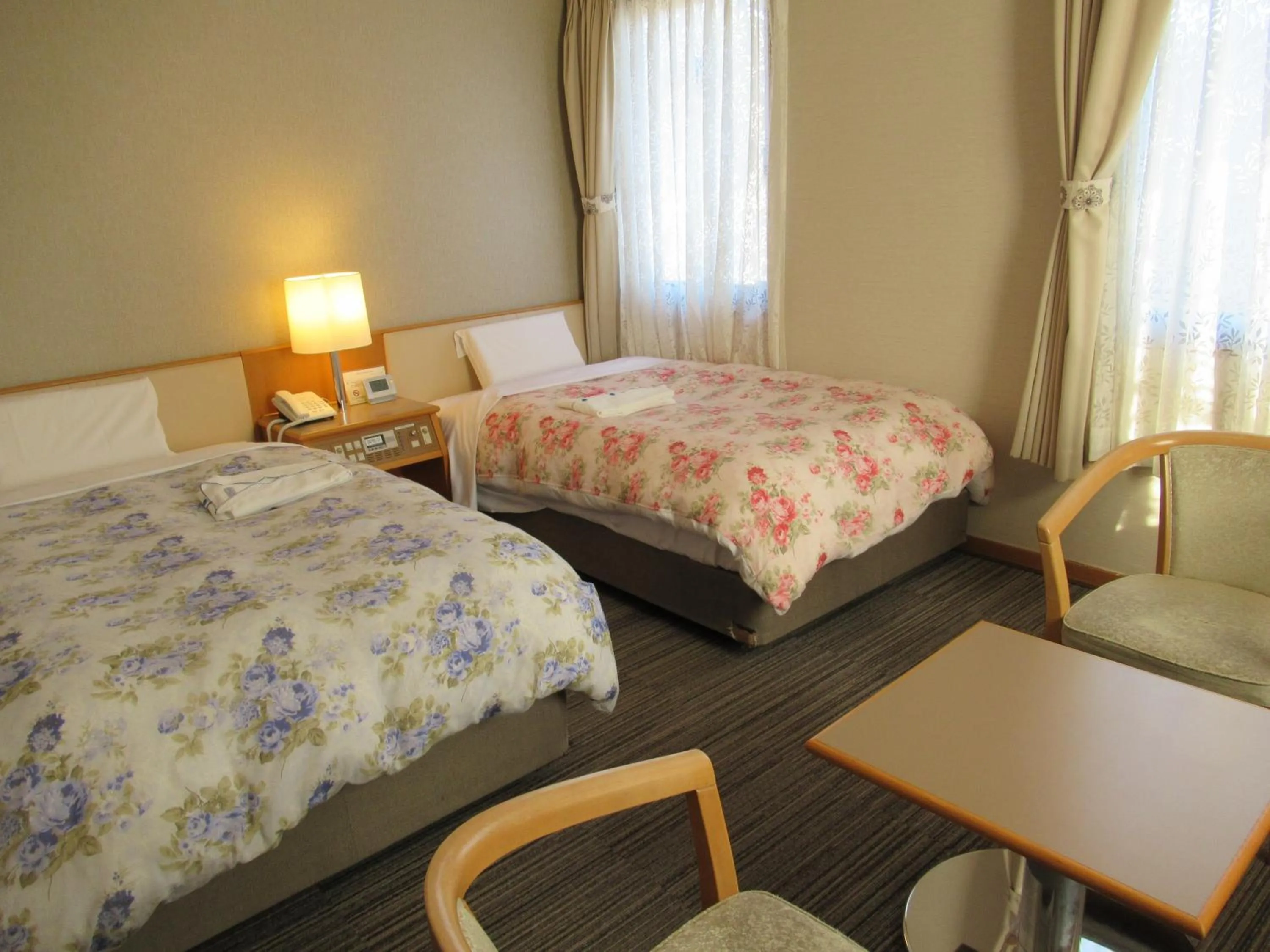 Photo of the whole room, Bed in Center Hotel Mihara