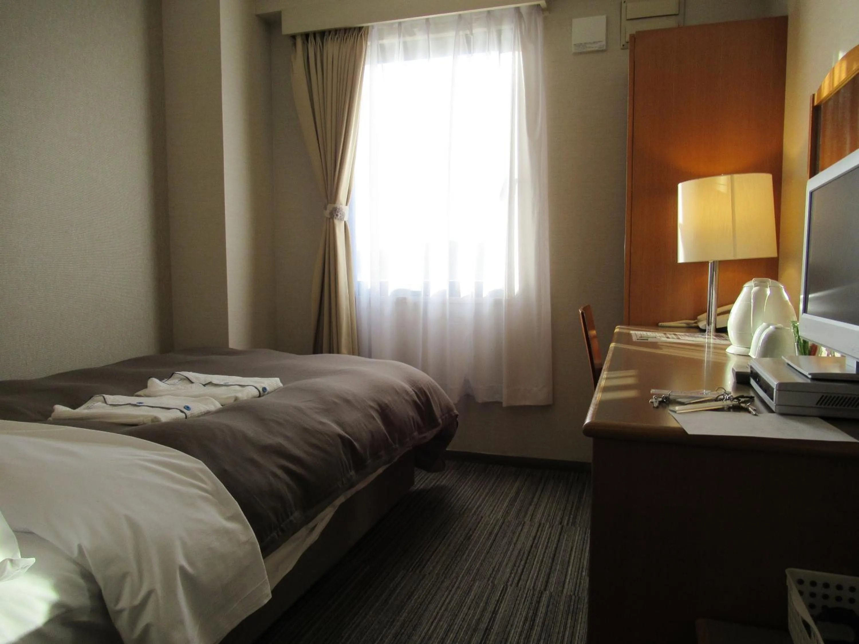 Photo of the whole room, Bed in Center Hotel Mihara