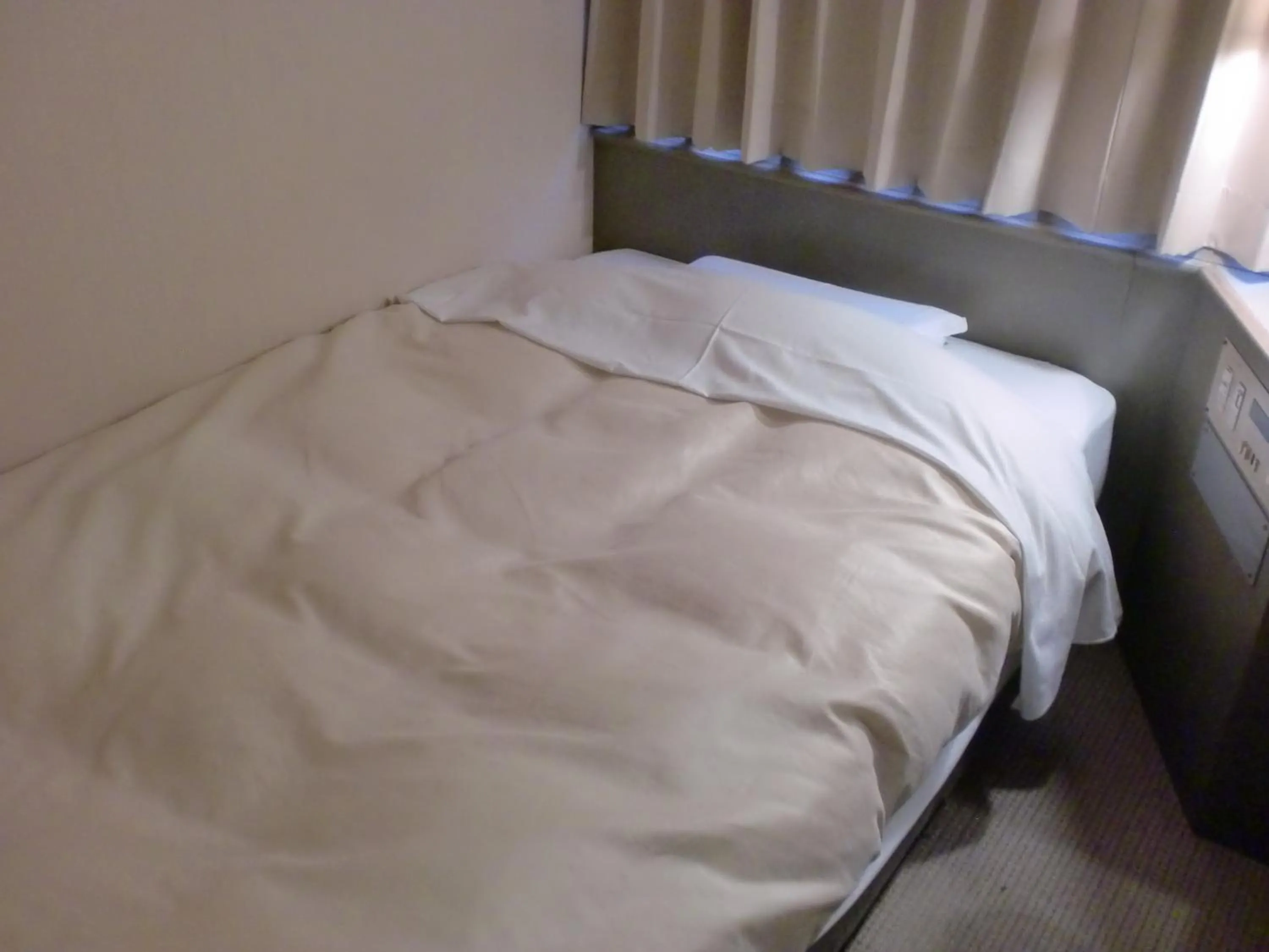 Bed in Tsuyama Central Hotel Annex