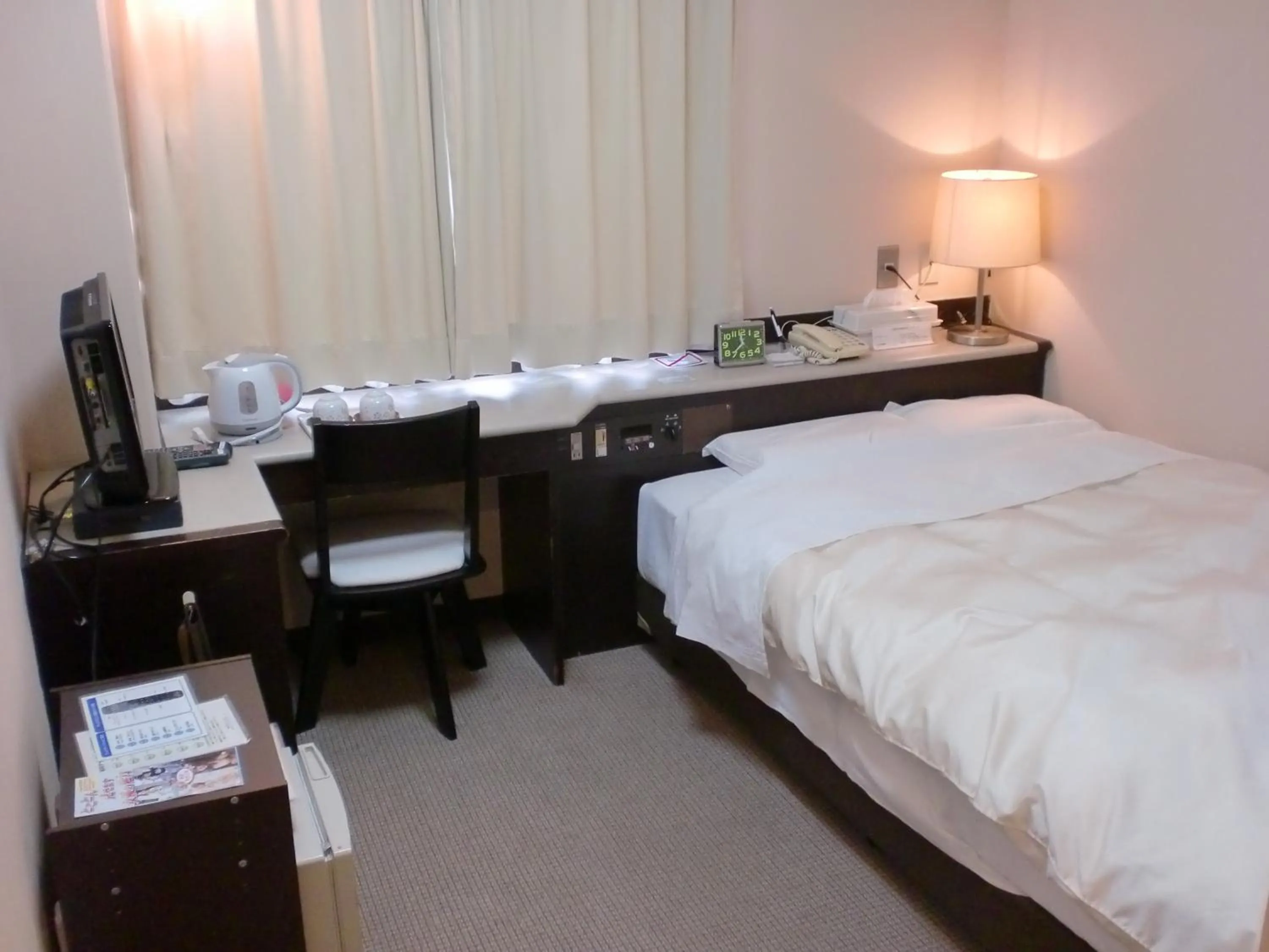 Bed in Tsuyama Central Hotel Townhouse