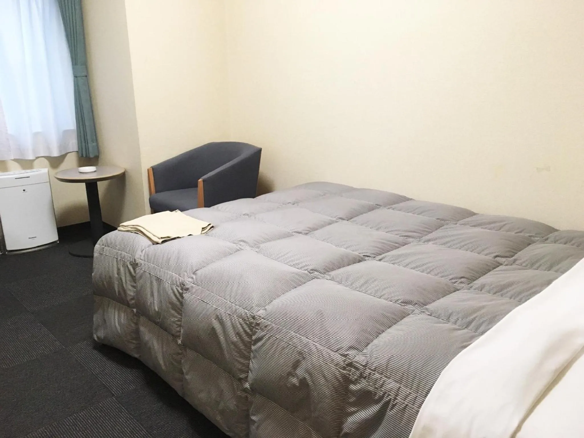 Bed in Oustat Kokusai Hotel Tajimi