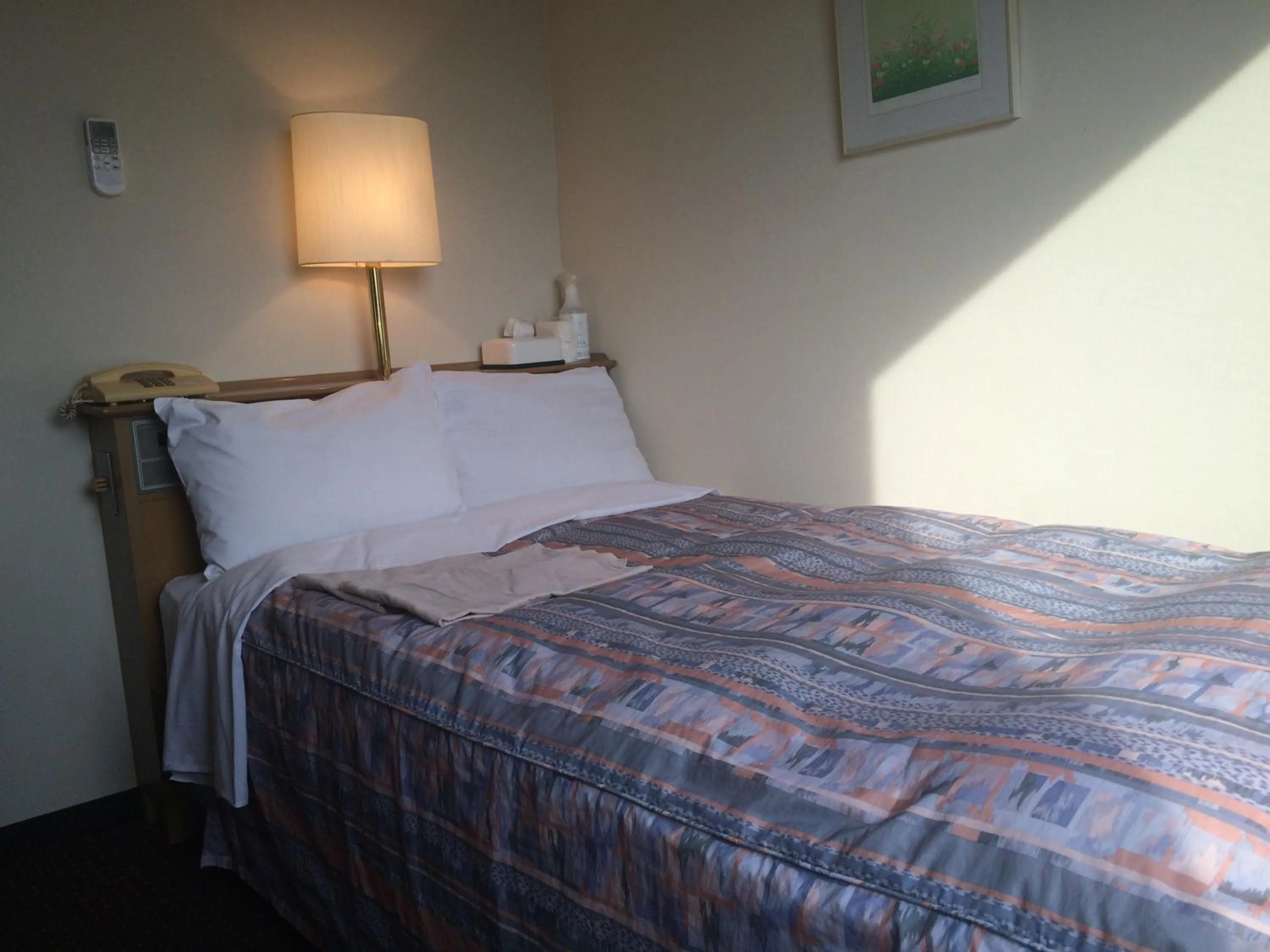 Photo of the whole room, Bed in Hotel Crown Hills Tokuyama