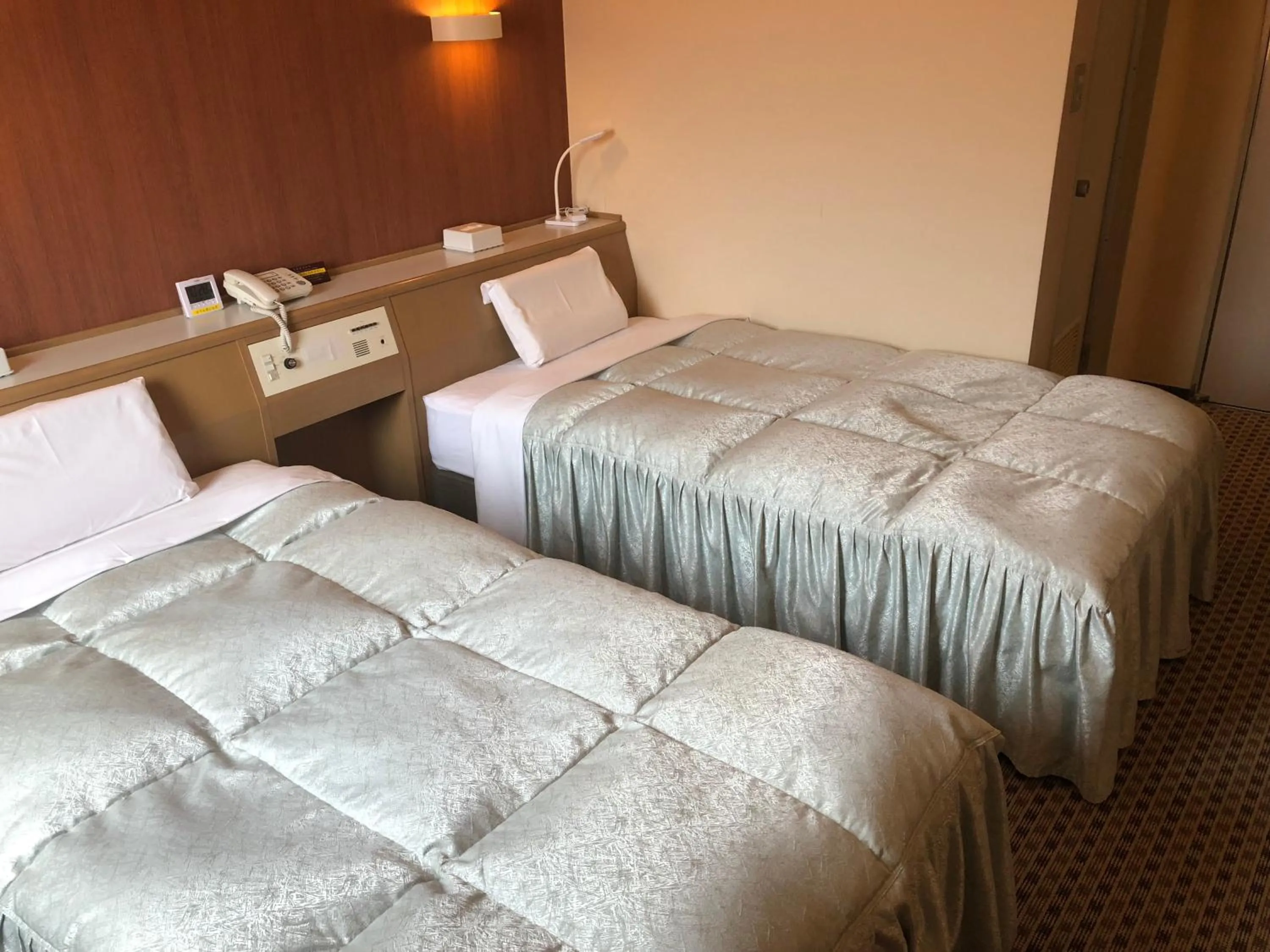 Bed in Hotel Hikari Hills