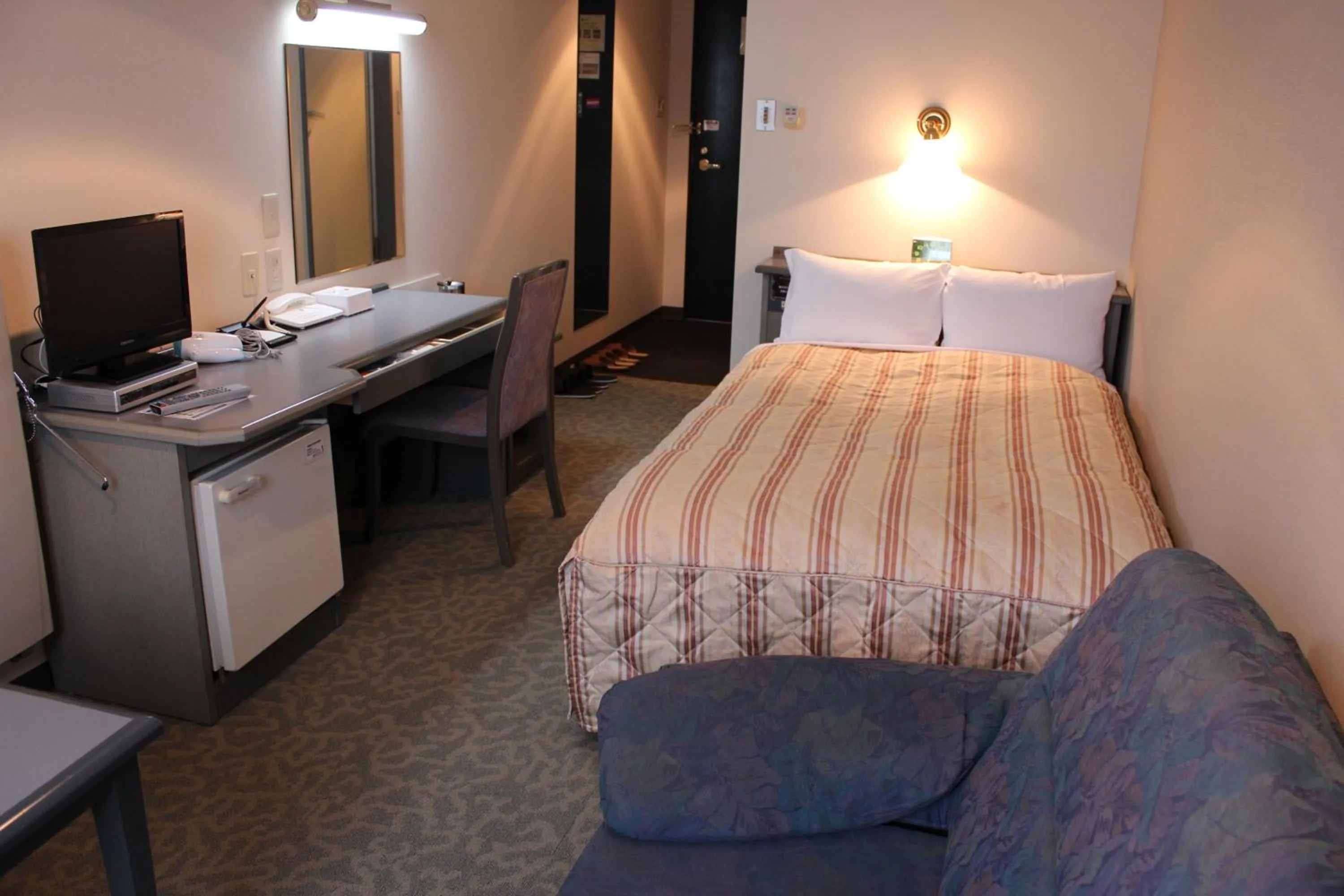 Photo of the whole room, Bed in Hotel Crown Hills Takaoka