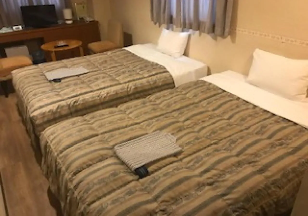 Photo of the whole room, Bed in Business Hotel Goi Hills