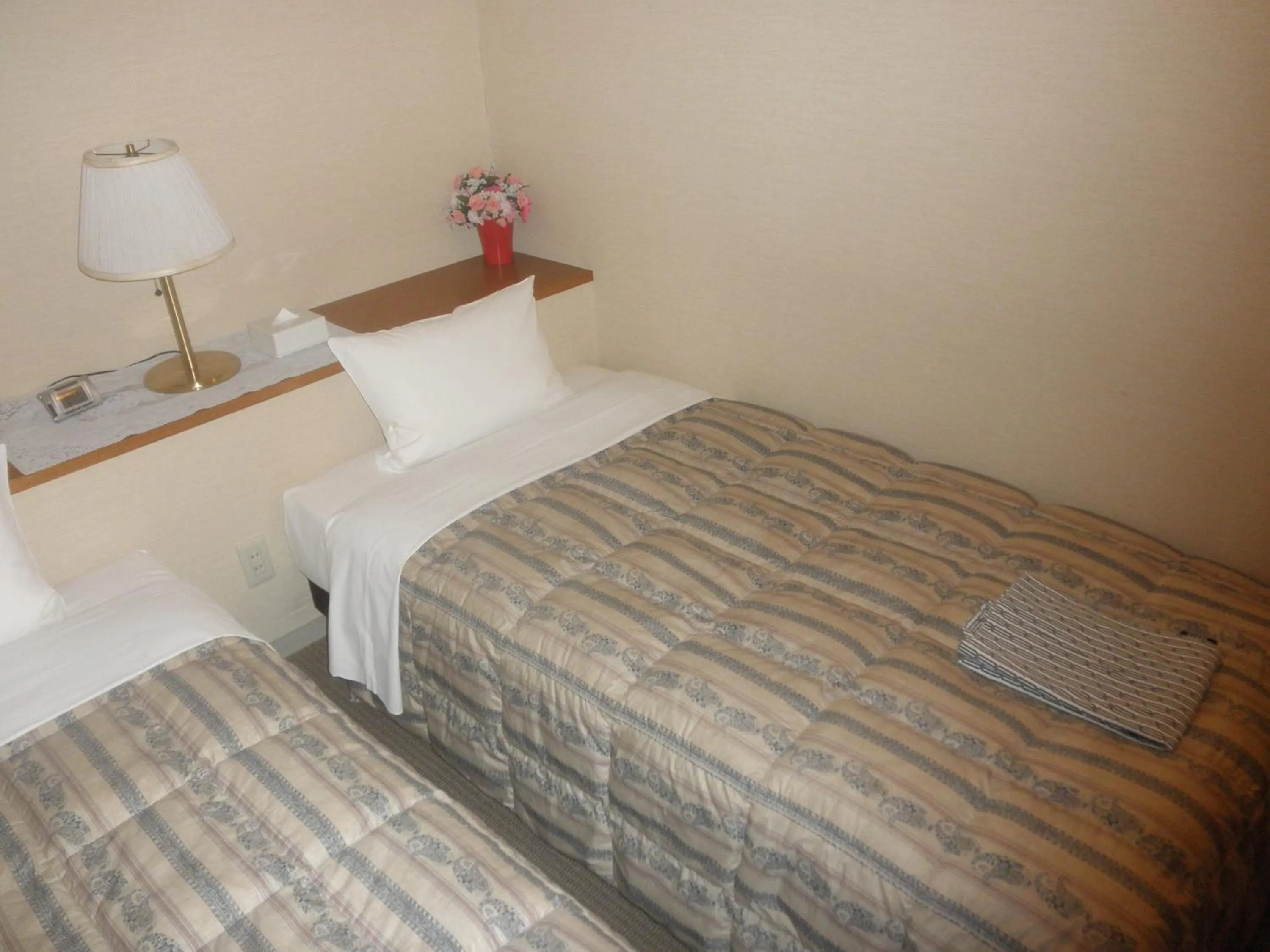 Bed in Business Hotel Goi Hills