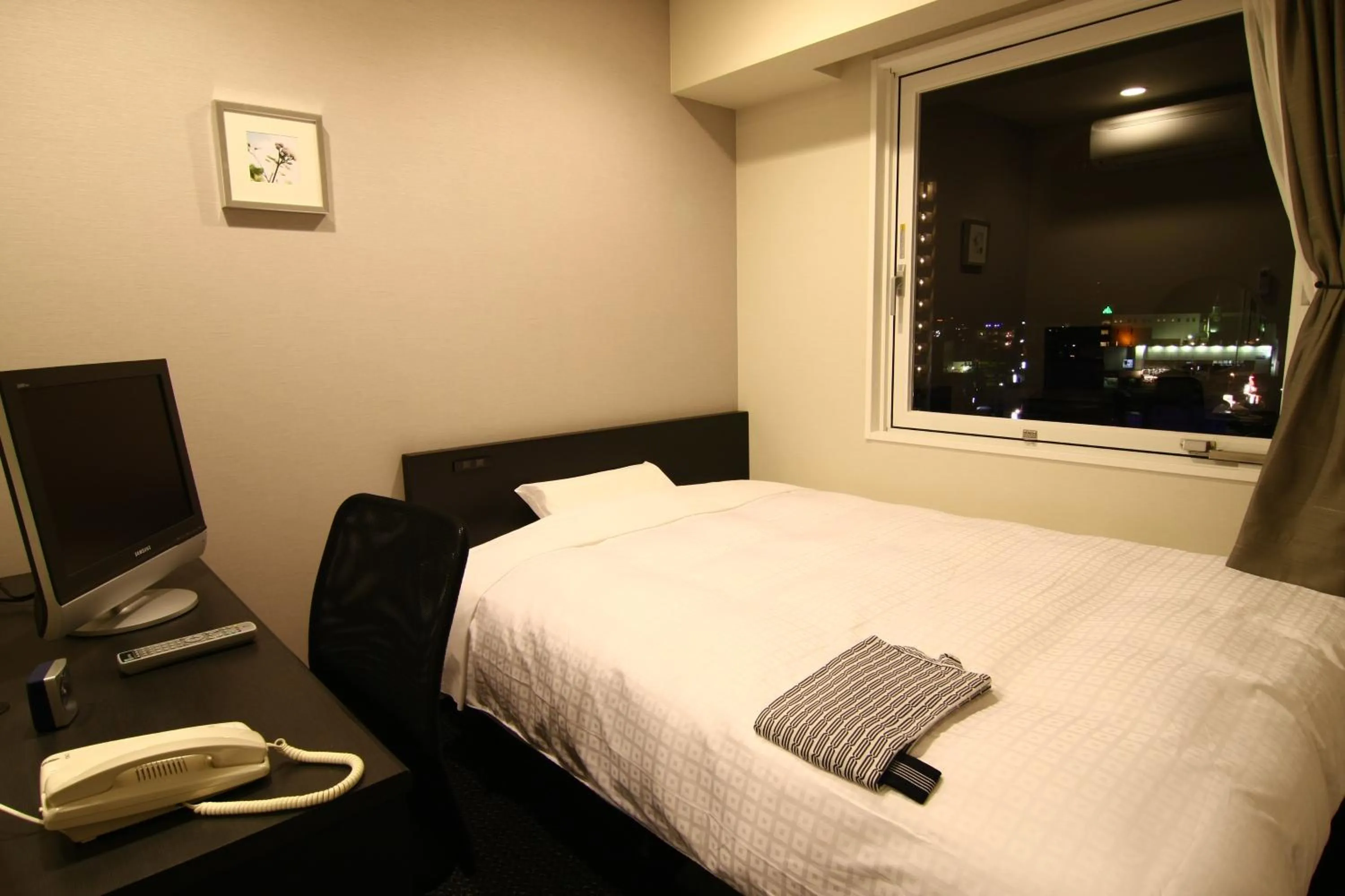 Bed in Hotel Crown Hills Kimitsu