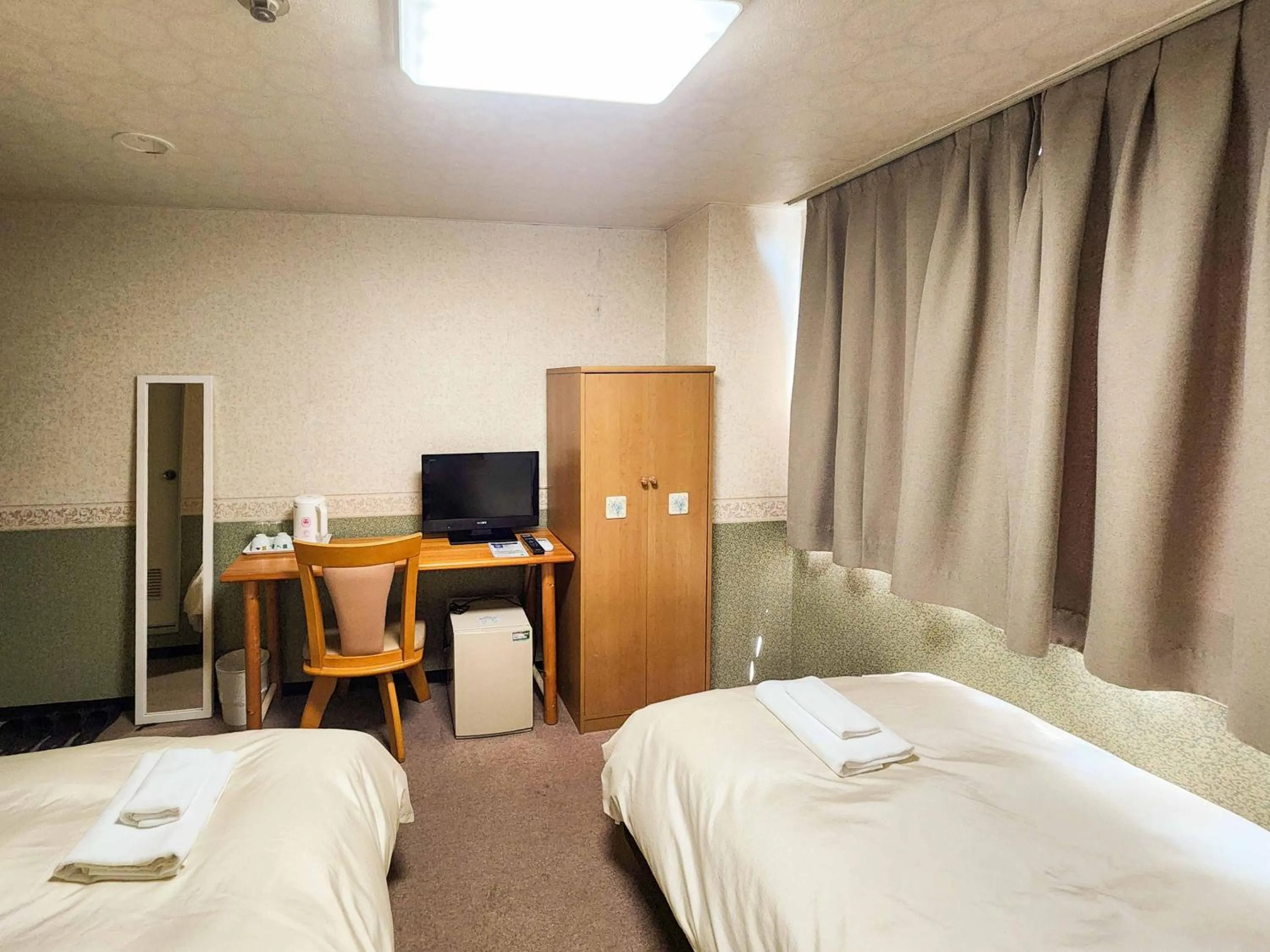 Photo of the whole room, Bed in Hotel Himeji Hills