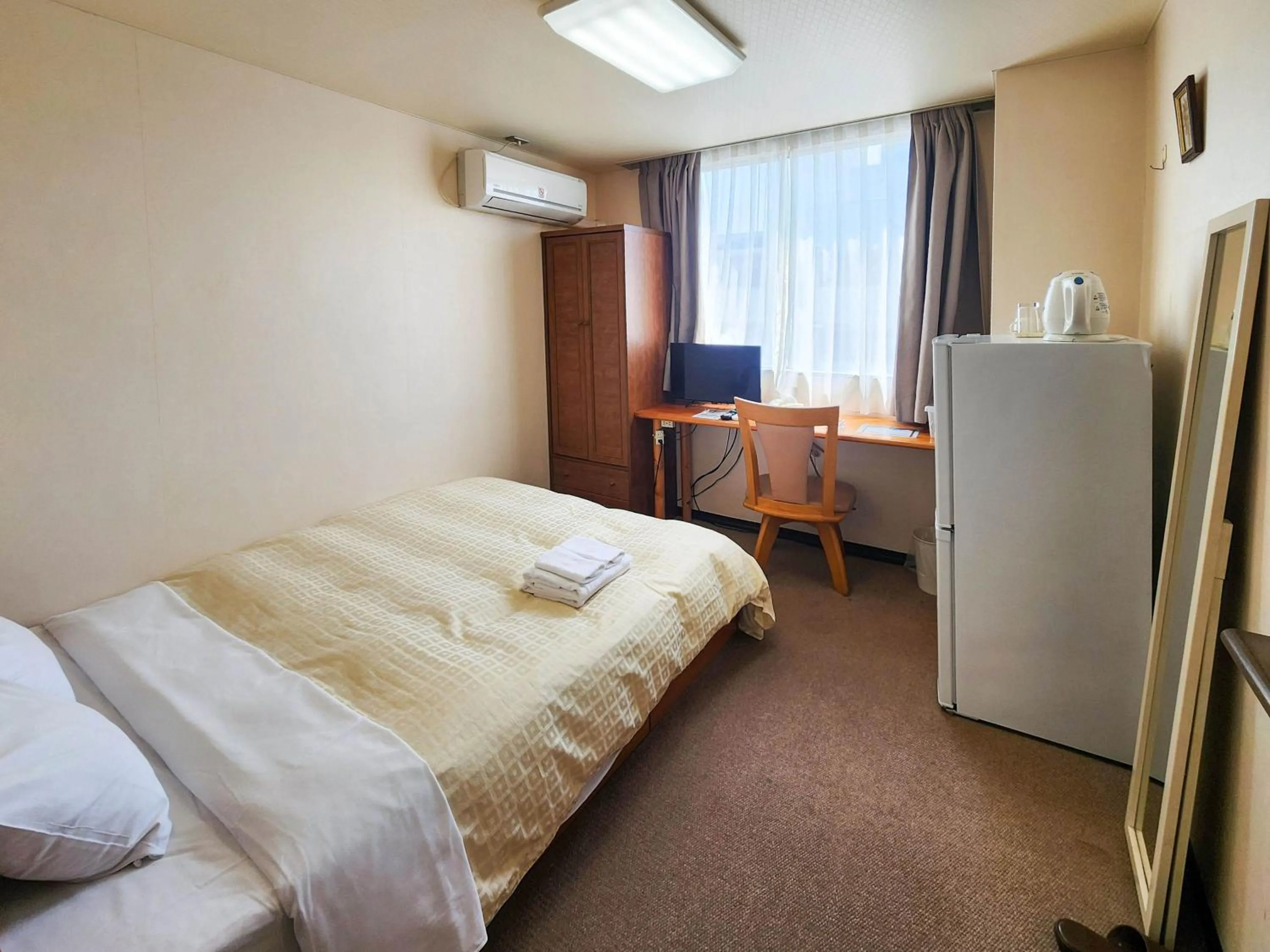 Photo of the whole room, Bed in Hotel Himeji Hills