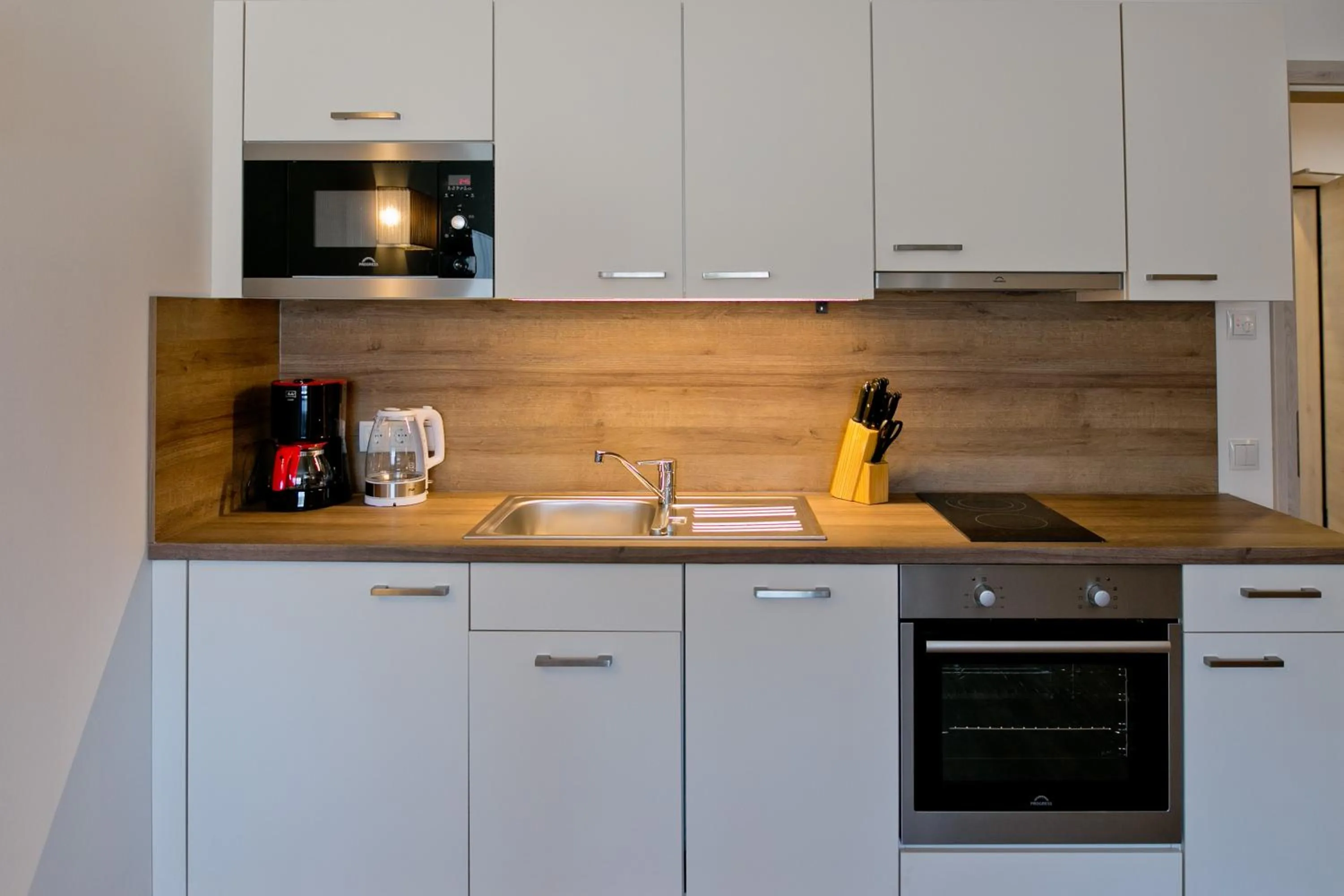 Kitchen or kitchenette in Landhotel Berger