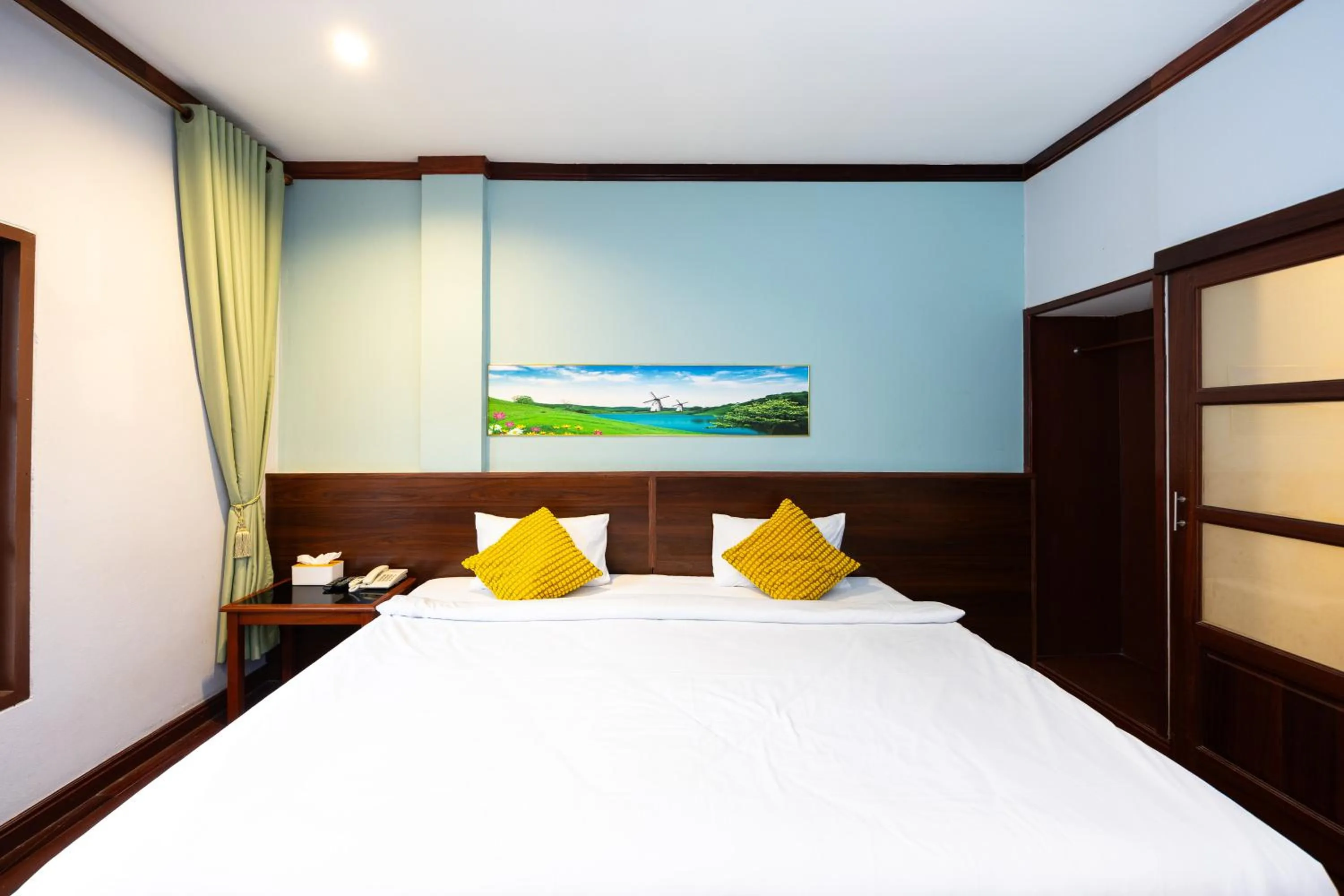 Photo of the whole room, Bed in The President Hotel at Chokchai 4