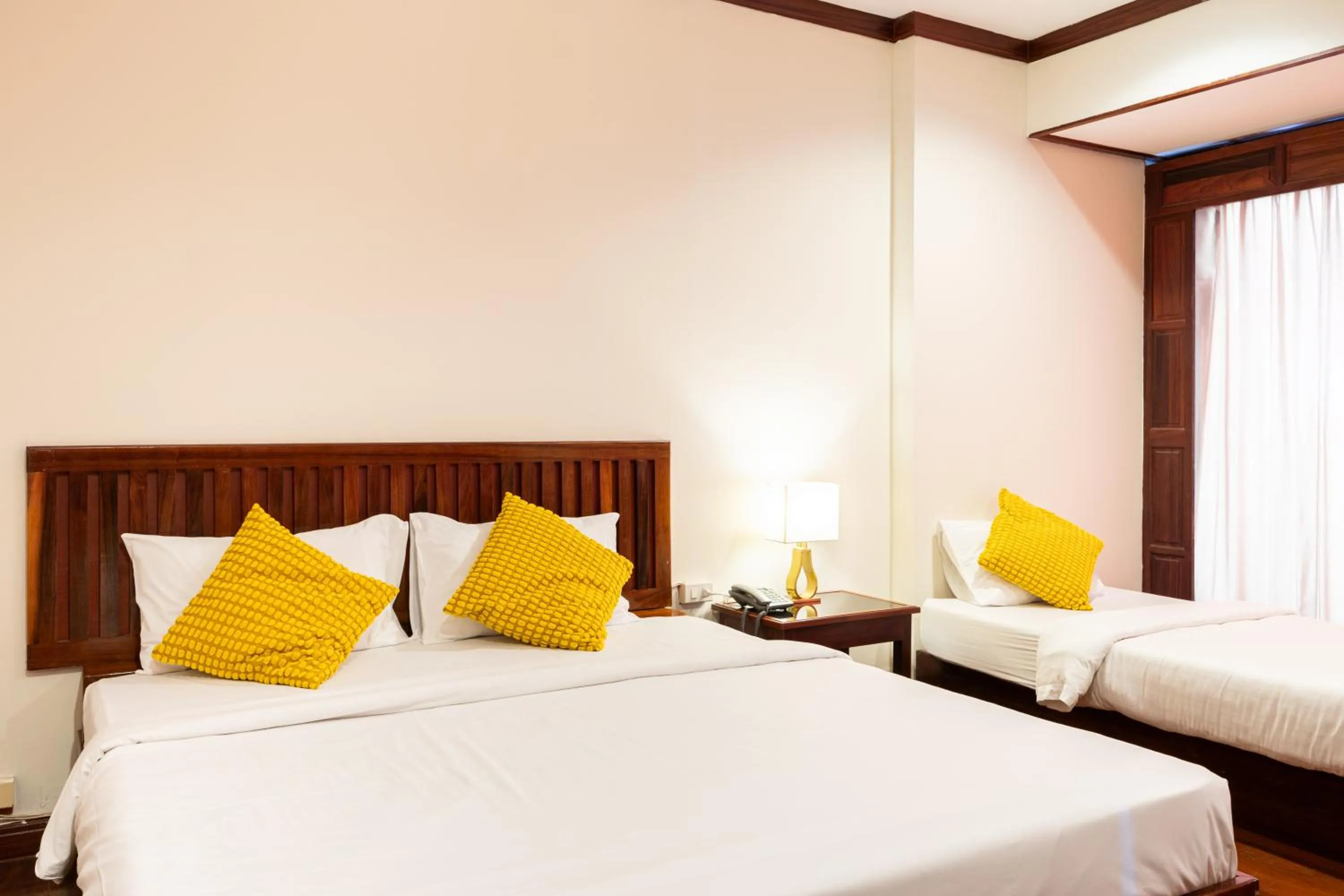 Bed in The President Hotel at Chokchai 4