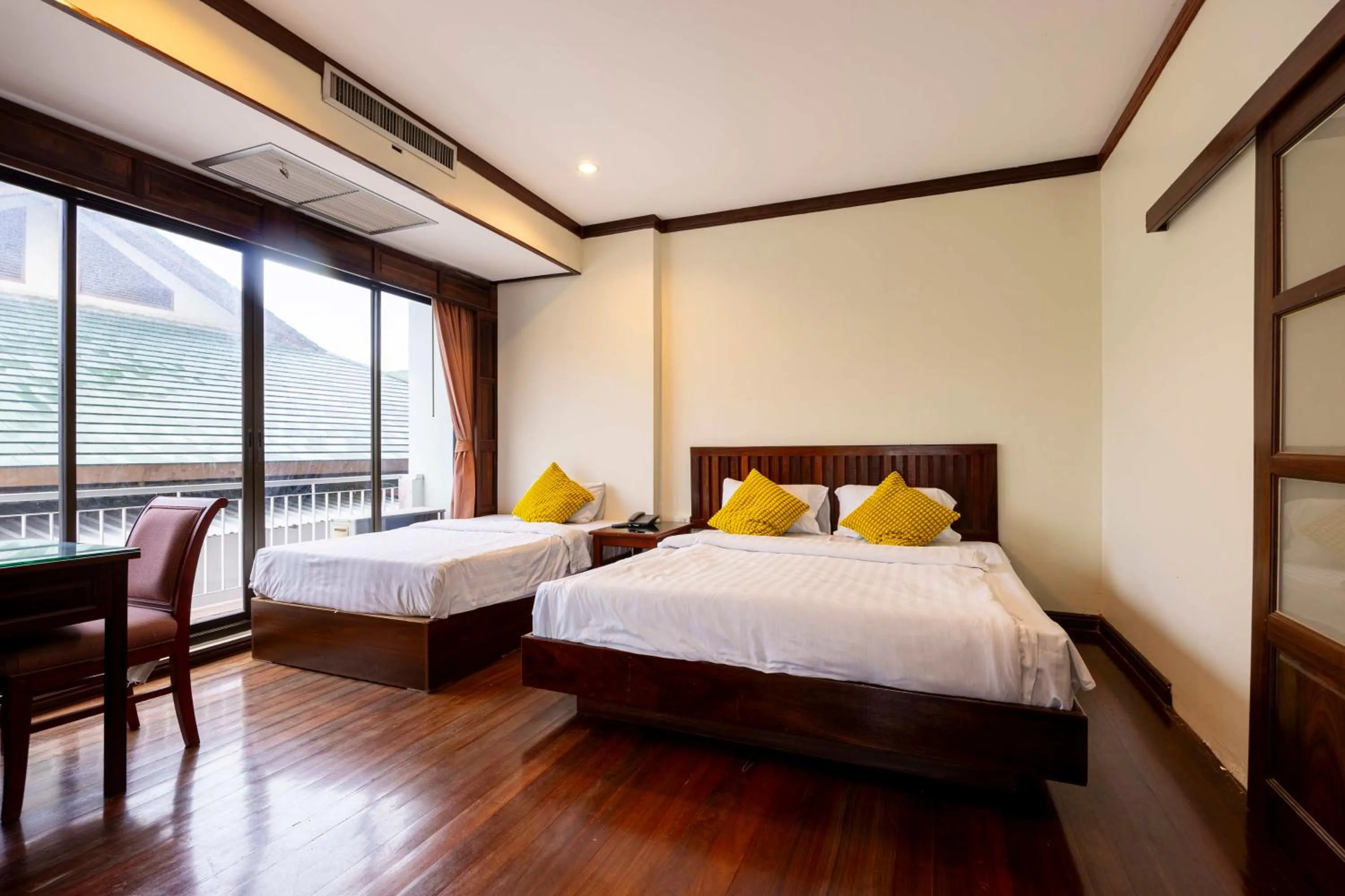 Bed in The President Hotel at Chokchai 4