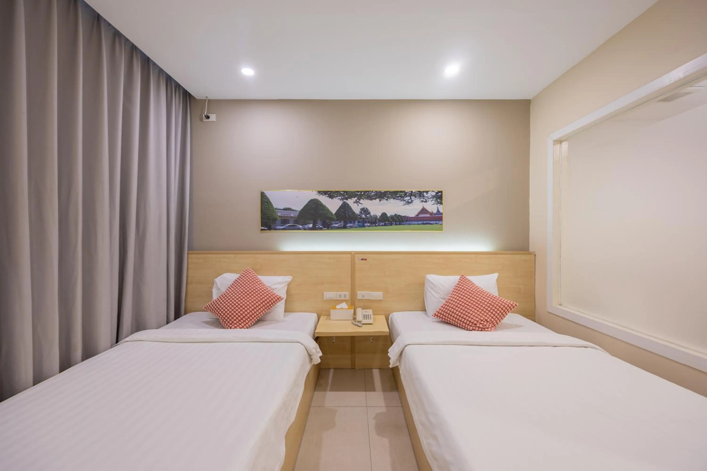 Bed in The President Hotel at Chokchai 4