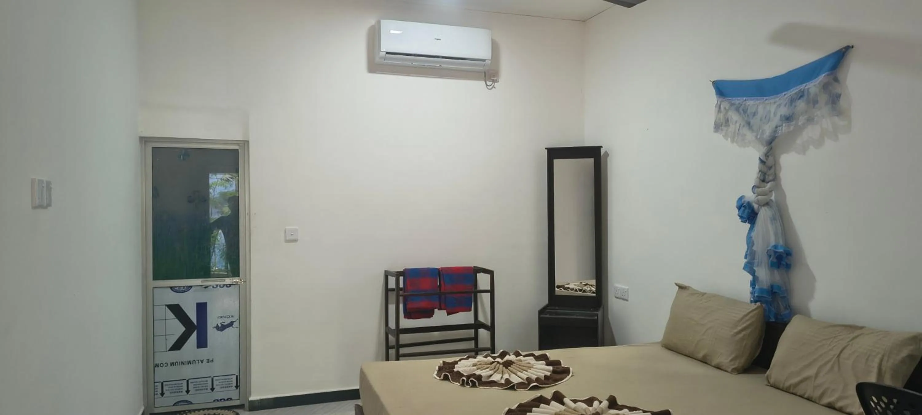 Bed in Nilaveli Beach Rooms