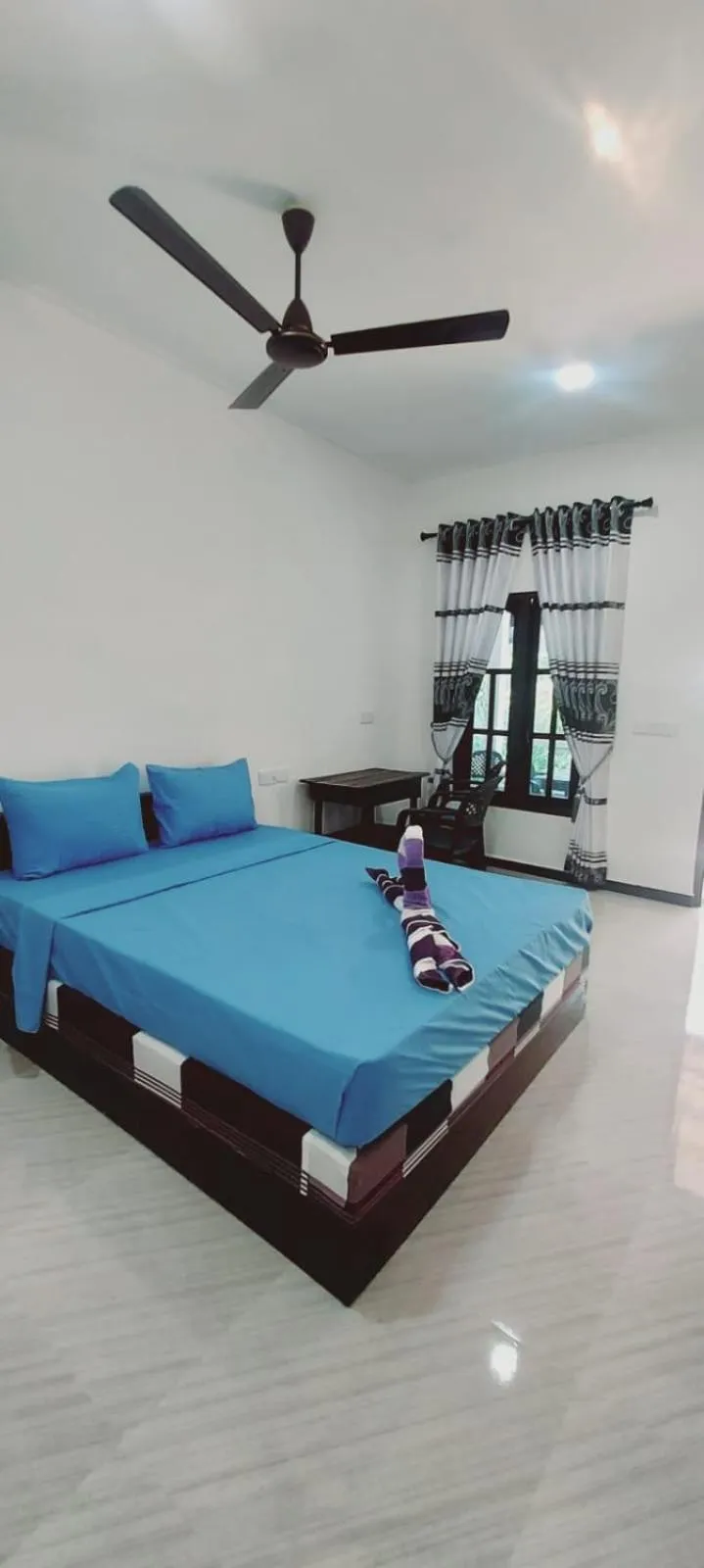 Bed in Nilaveli Beach Rooms