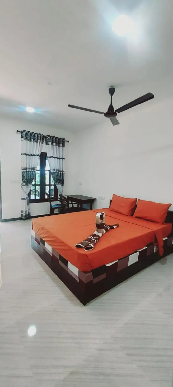 Bed in Nilaveli Beach Rooms