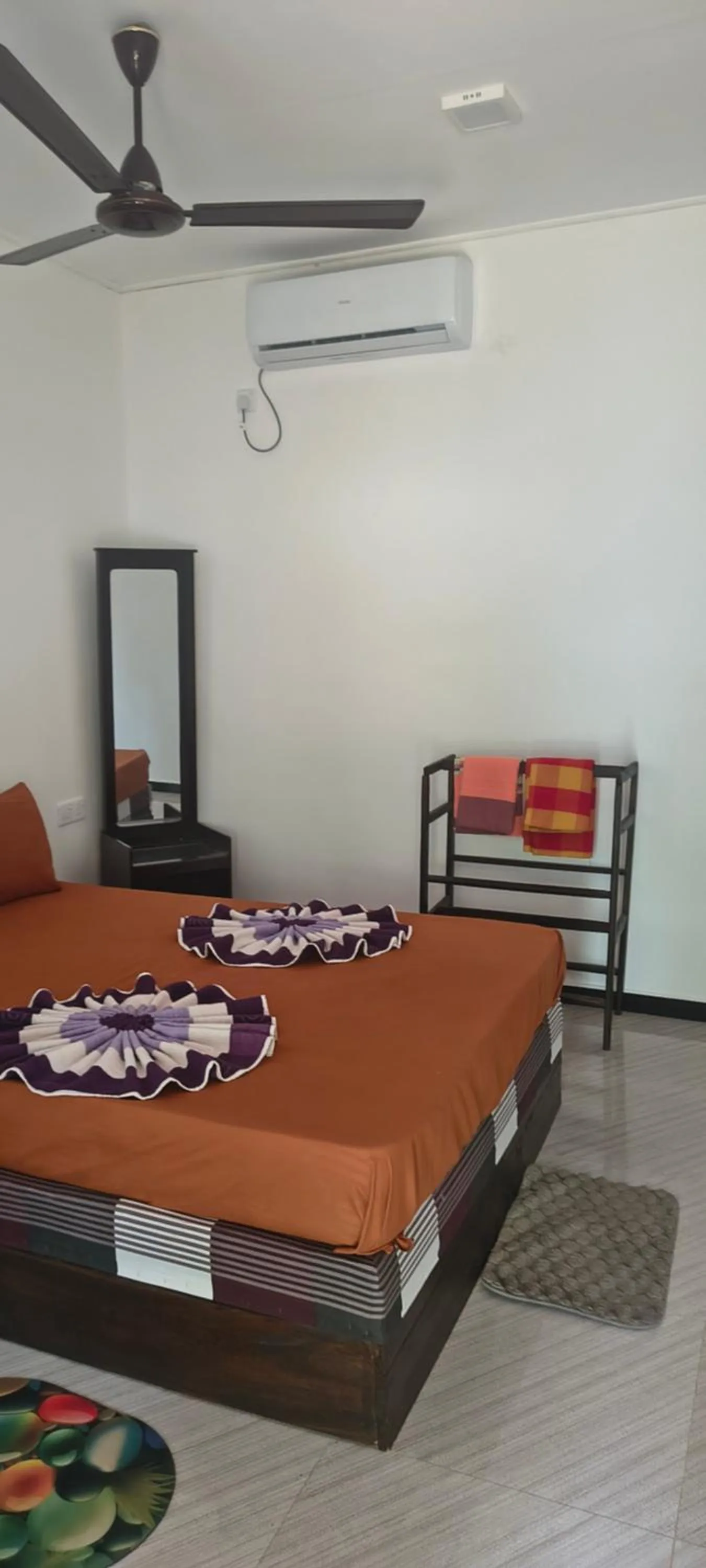 Bed in Nilaveli Beach Rooms