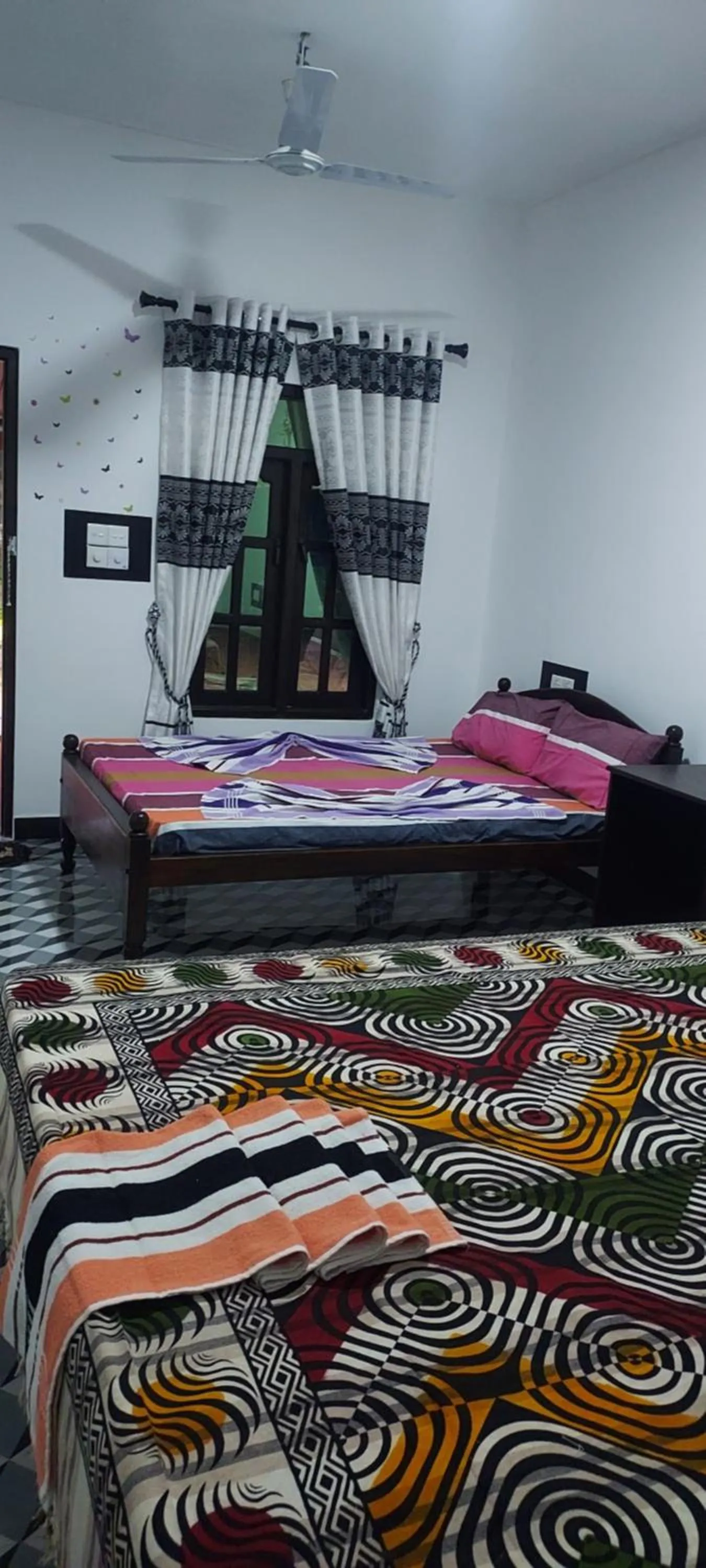 Bed in Nilaveli Beach Rooms