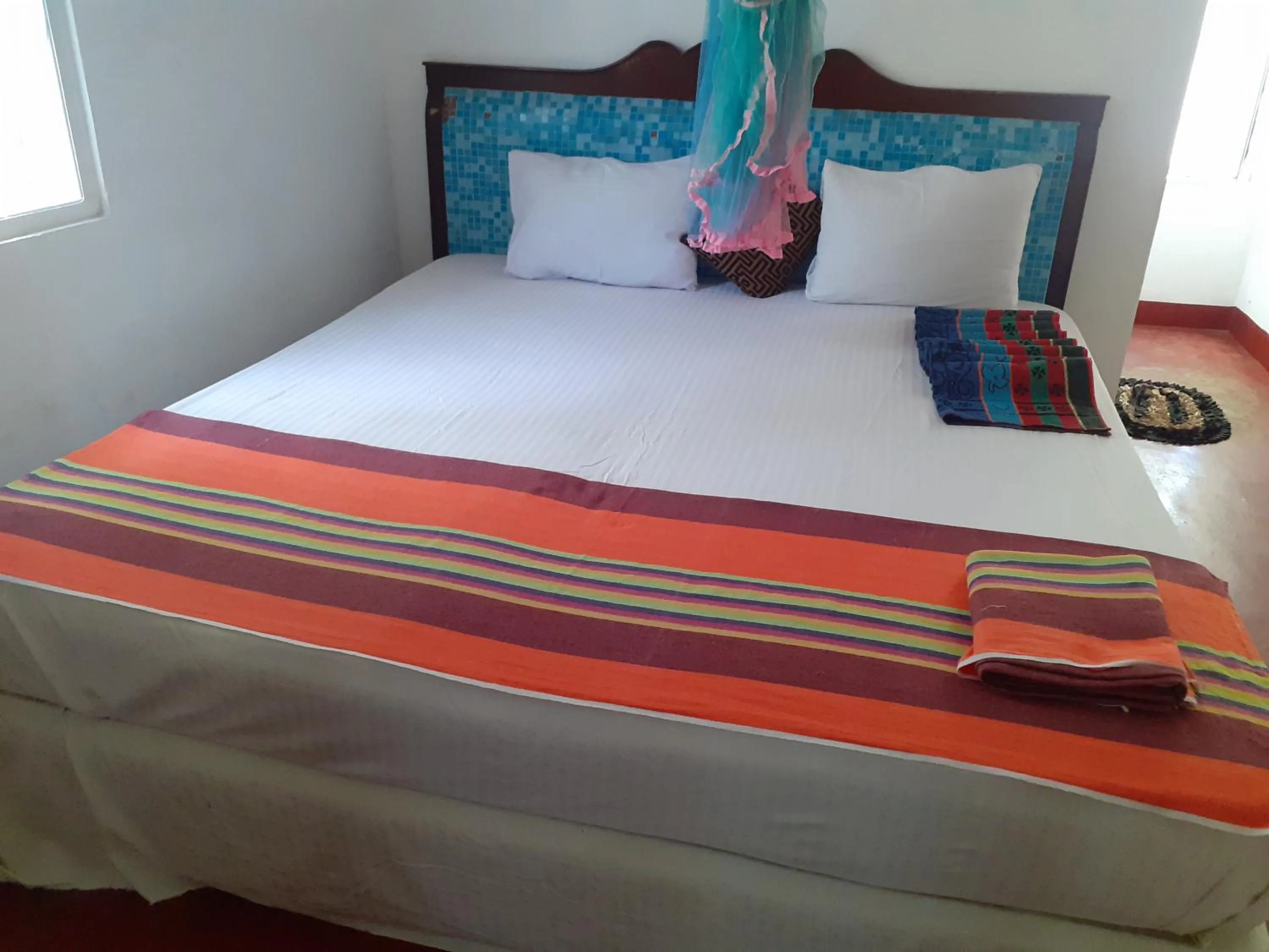 Bed in Nilaveli Beach Rooms