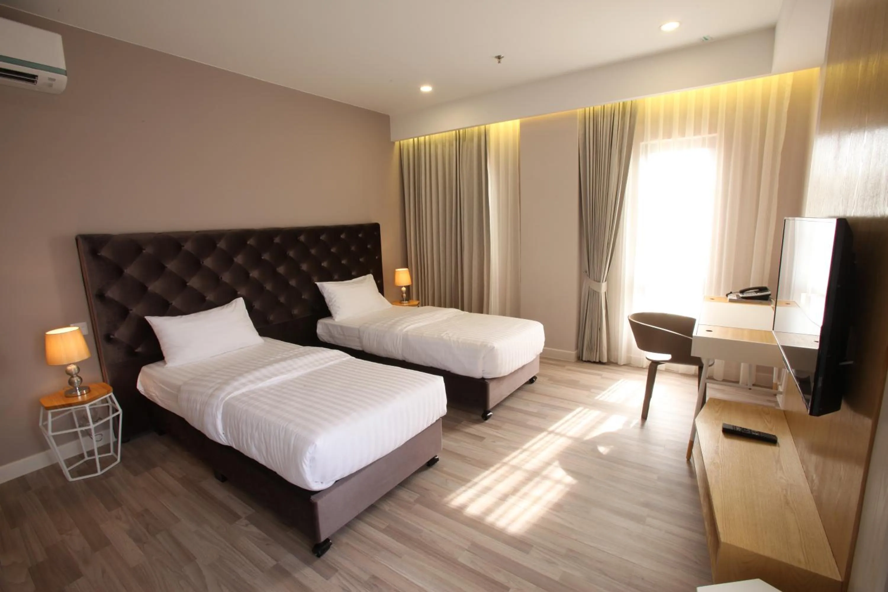 Bed in D'Anggerek Serviced Apartment