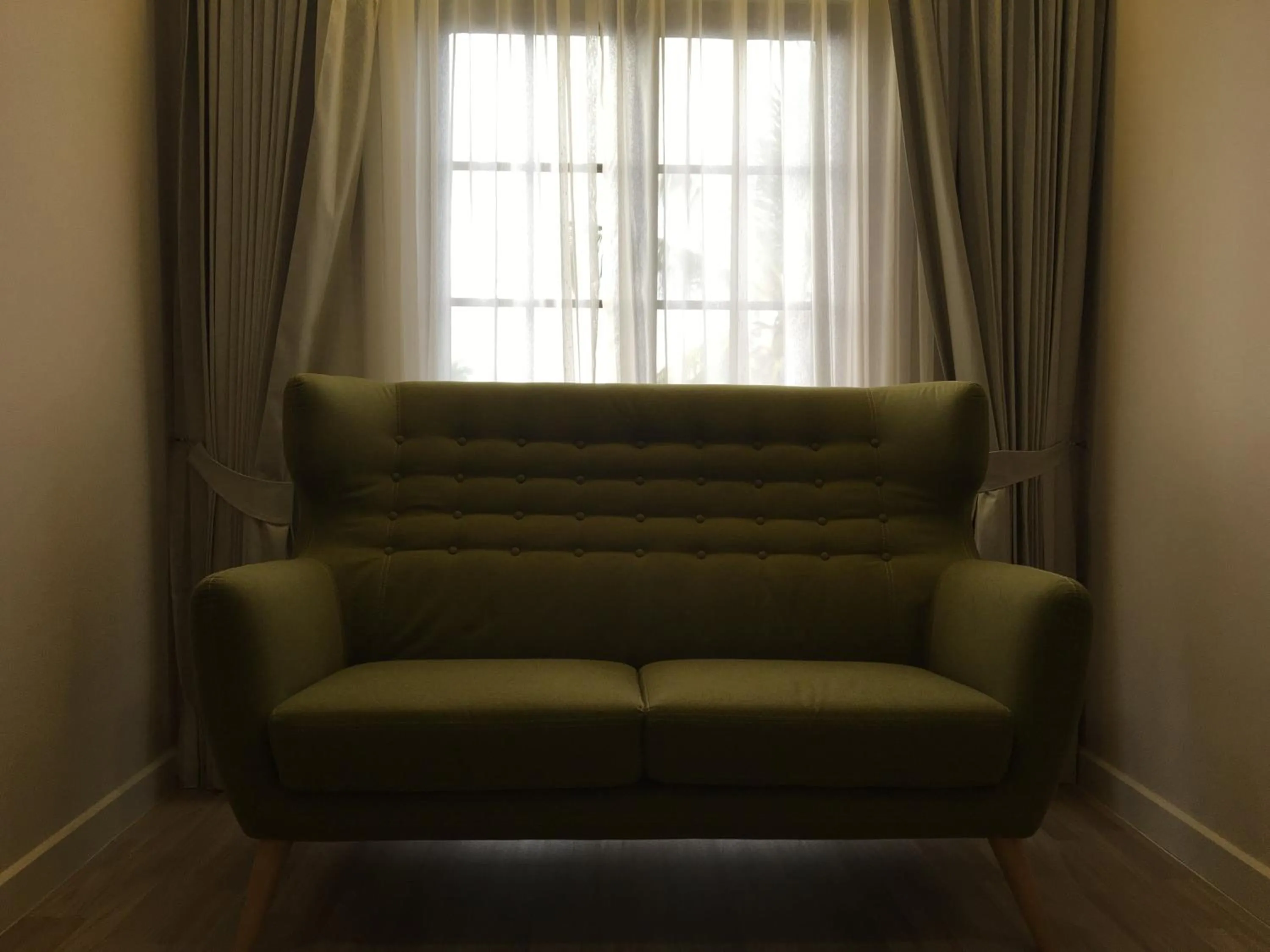 Seating area in D'Anggerek Serviced Apartment