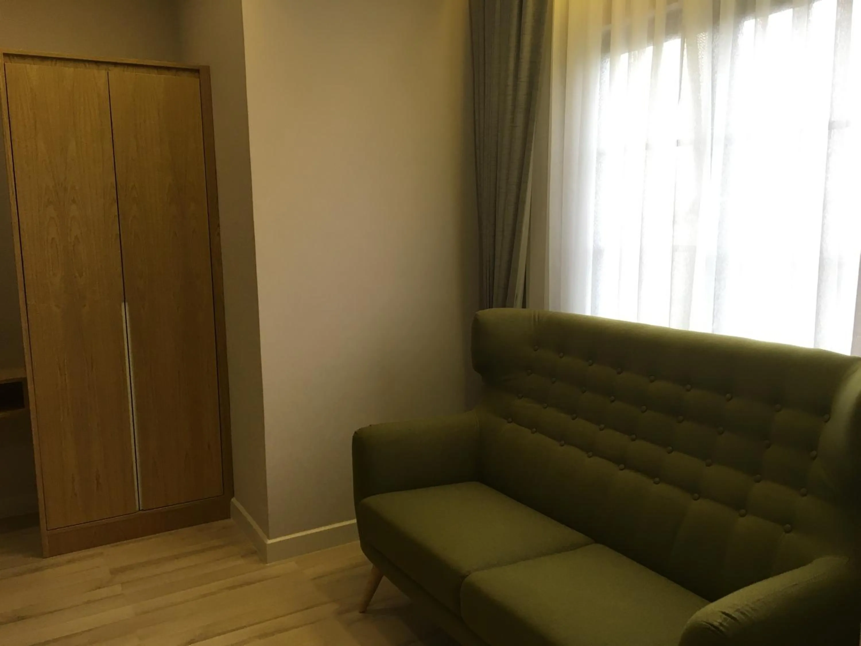 Seating area in D'Anggerek Serviced Apartment